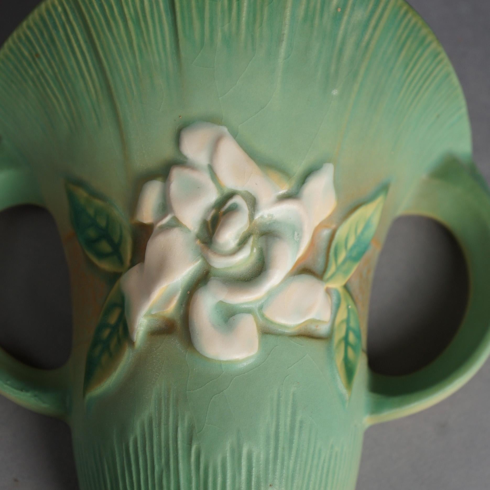 Roseville Art Pottery Wall Pocket, Gardenia in Green, Signed, C1950

Measures- 8.5''H x 7''W x 3.5''D
