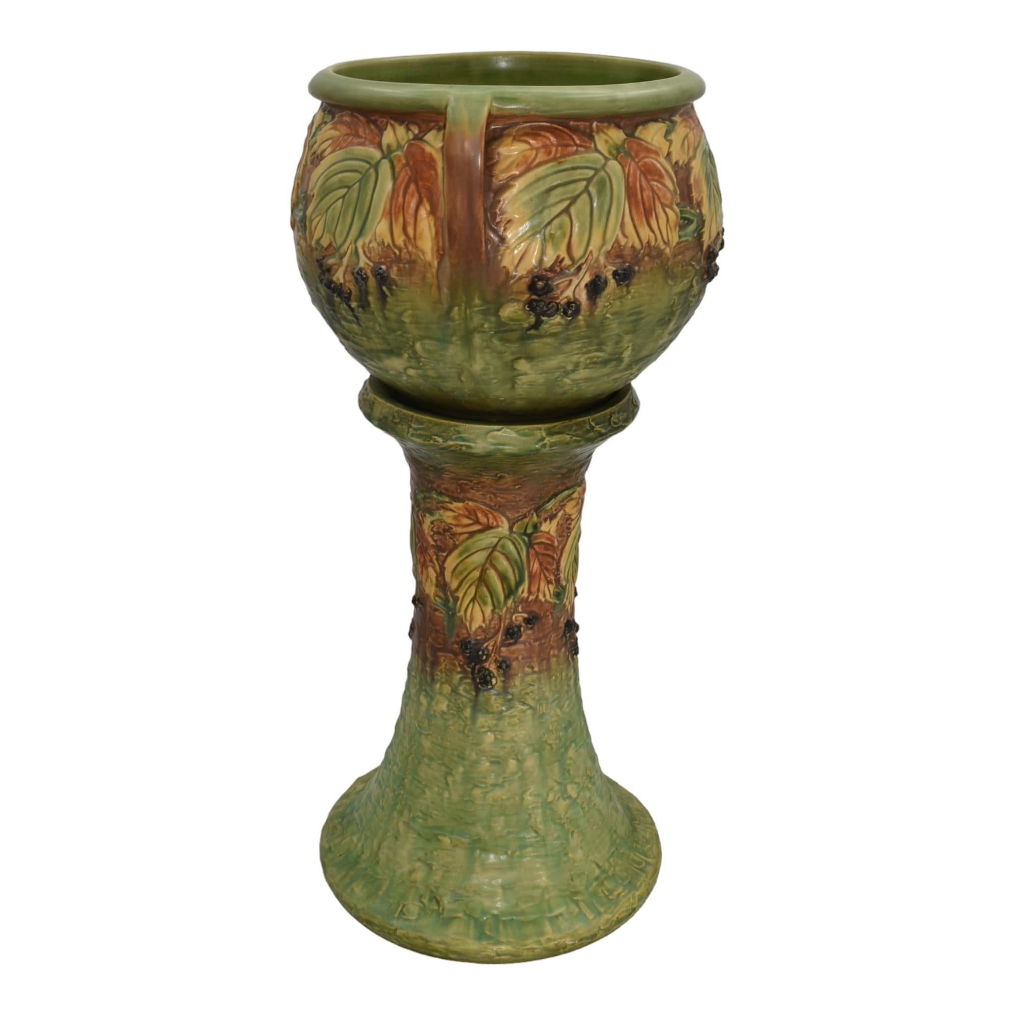 Roseville Blackberry 1932 Vintage Art Pottery Ceramic Jardiniere Pedestal 623-10
Rare, wonderful and large factory matched jardiniere and pedestal with great color.
Excellent original condition. No chips, cracks, damage or repair of any kind.
Bottom