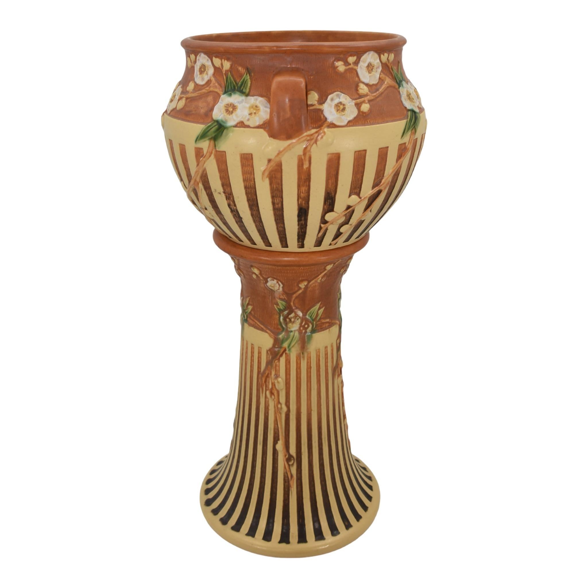 Roseville Cherry Blossom Brown 1933 Pottery Ceramic Jardiniere Pedestal 627
Decorative and rarely seen set with good mold with pleasing colors.
Excellent original condition. No chips, cracks, damage or repair of any kind. Crazing.
Bottom of