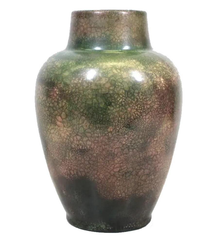 American Arts & Crafts 
Roseville for Tiffany
Chinese form  Pauleo pattern 
Vase
Glazed ceramic
Circa 1900

DIMENSIONS
Height: 15.75 inches (40.01 cm)
Diameter: 10.5 inches (26.67 cm)

ABOUT VASE
A rare American Arts & Crafts ceramic vase in the