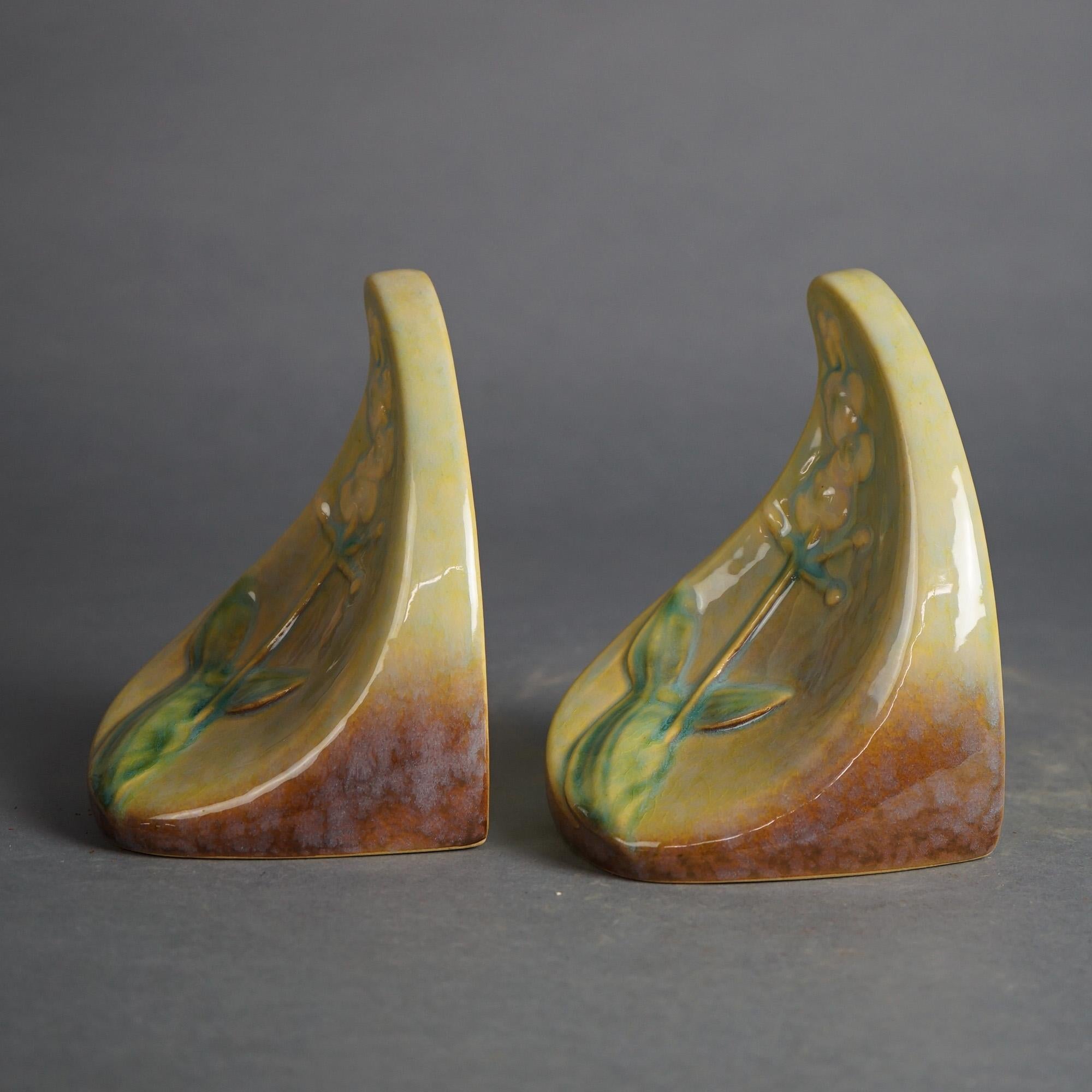 Roseville Wincraft Art Pottery Bookends, Floral, C1948

Measures- 6''H x 5''W x 4.5''D