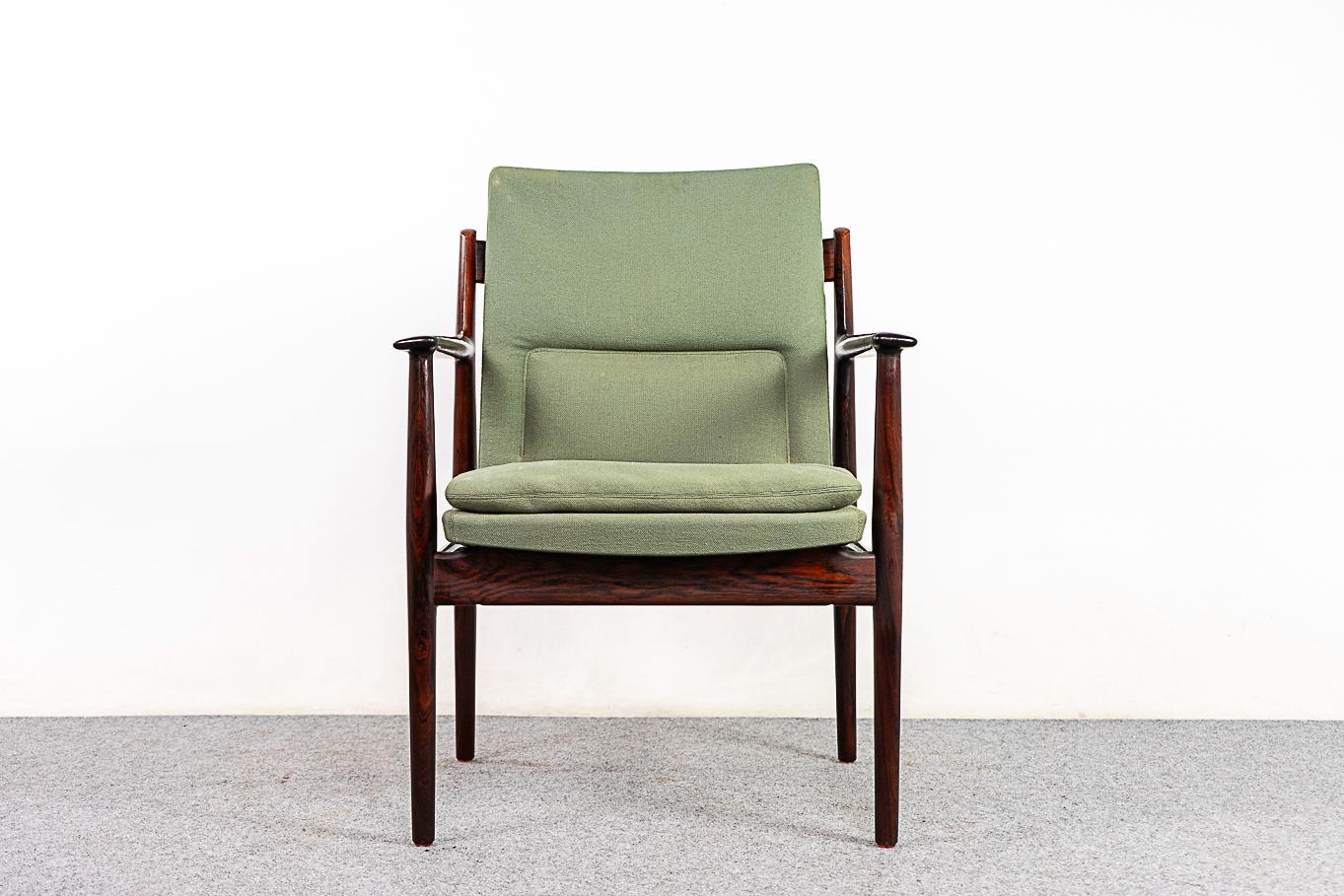 Rosewood lounge chair by Arne Vodder for Sibast, circa 1960's. Stunning sculpted rosewood frame with beautiful joinery and an elegant profile. Original upholstery with significant wear, foam requires immediate replacement. Quality designer piece to