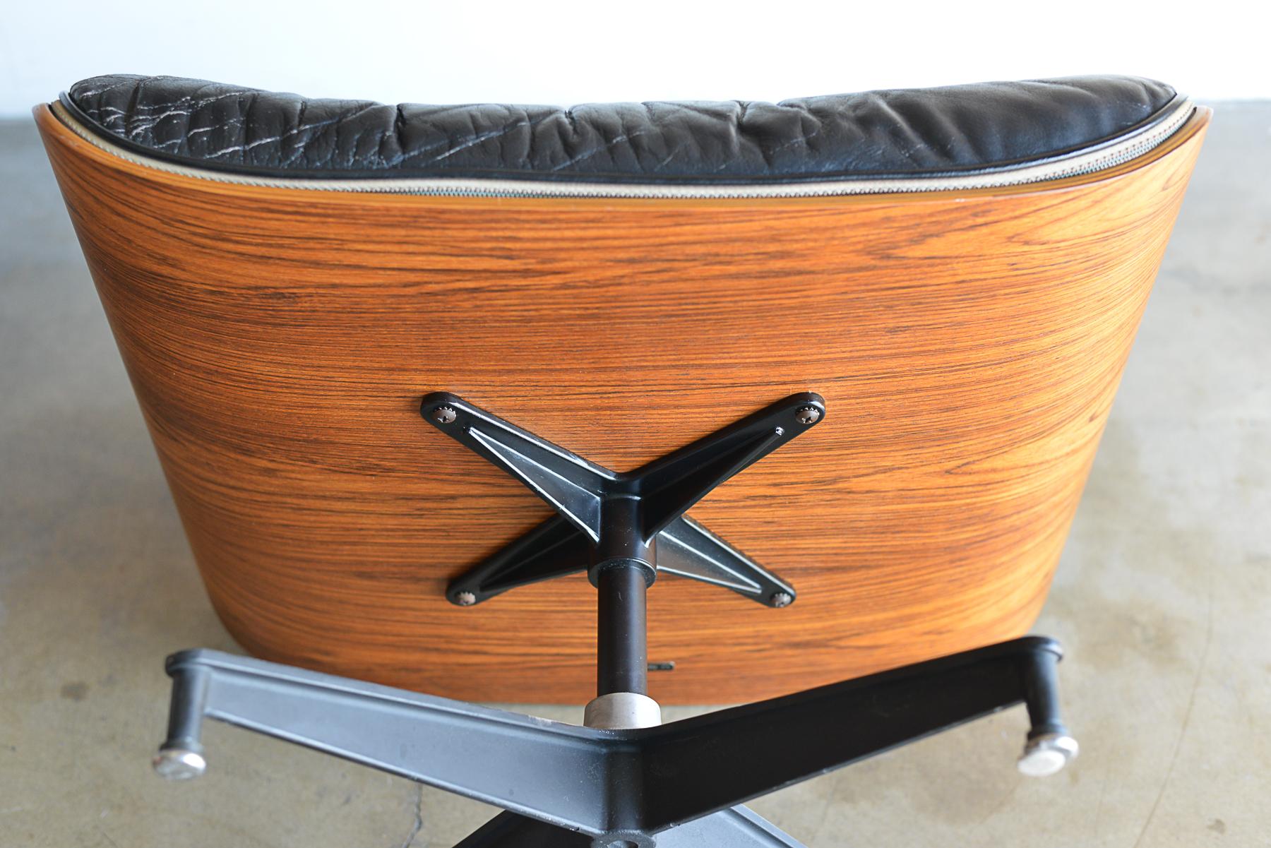 Rosewood and Black Leather Eames 671 Ottoman, ca. 1970 1