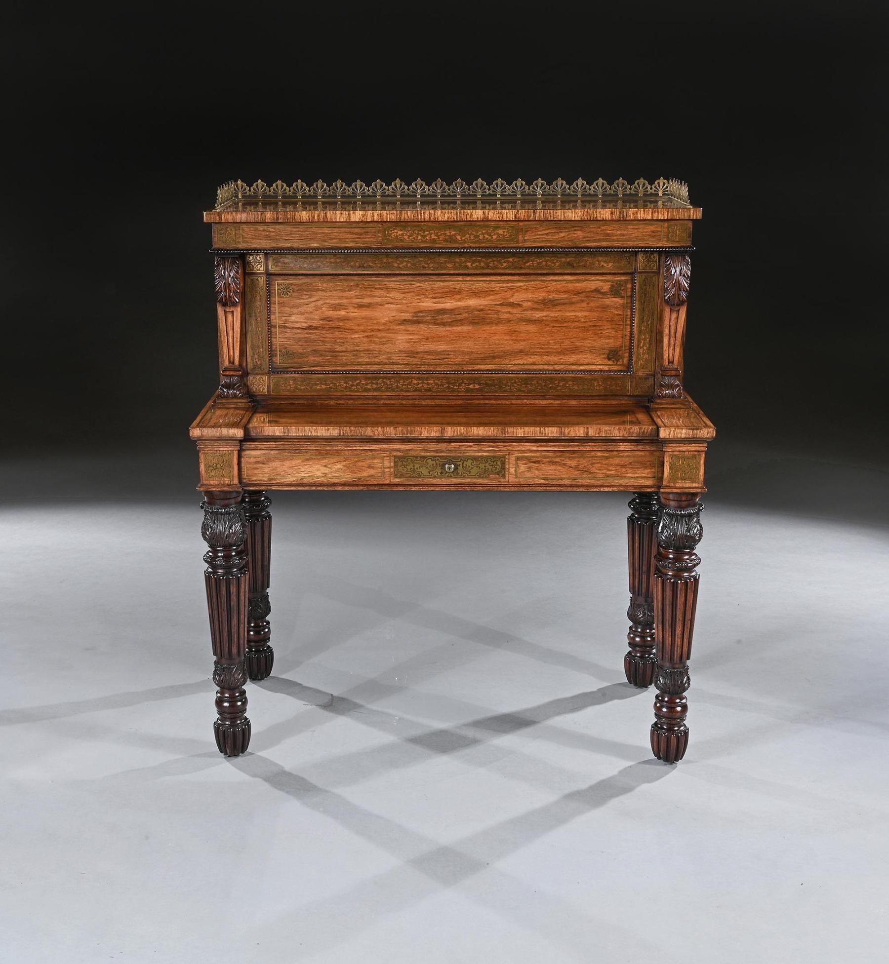 An Extremely Fine and rare Rosewood and Brass Inlaid Writing Table Attributed to the Oxford Street Workshop of Gillows.

English c.1820-1830

With a raised back comprising a three quarter pierced anthemion brass gallery above a panelled front