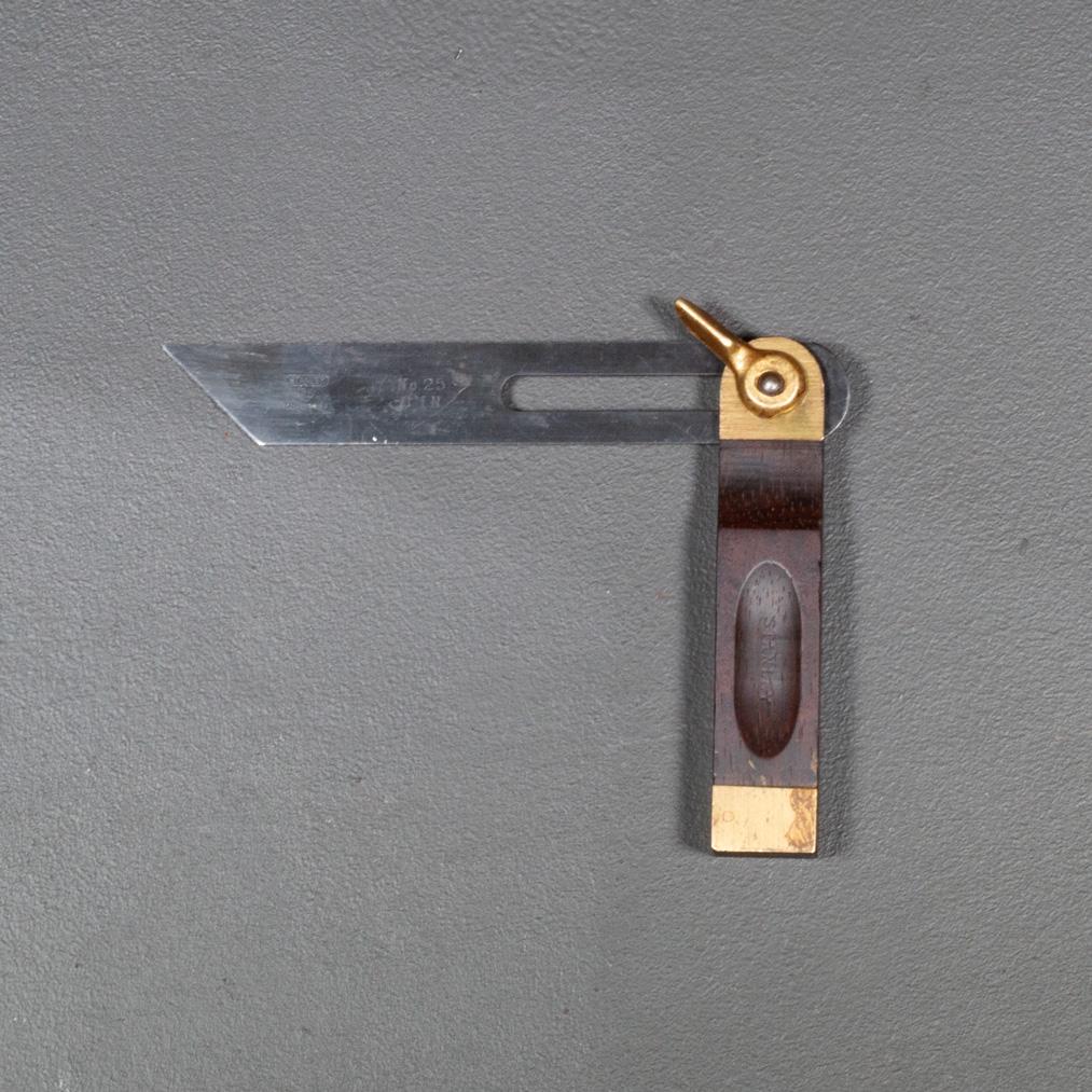 ABOUT

Adjustable No. 25 six inch bevel. 

    CREATOR Stanley Tool Co.
    DATE OF MANUFACTURE c.1920-1940.
    MATERIALS AND TECHNIQUES Rosewood, Brass. 
    CONDITION Good. Wear consistent with age and use.
    DIMENSIONS H 9.25 in. W 1 in. D .75