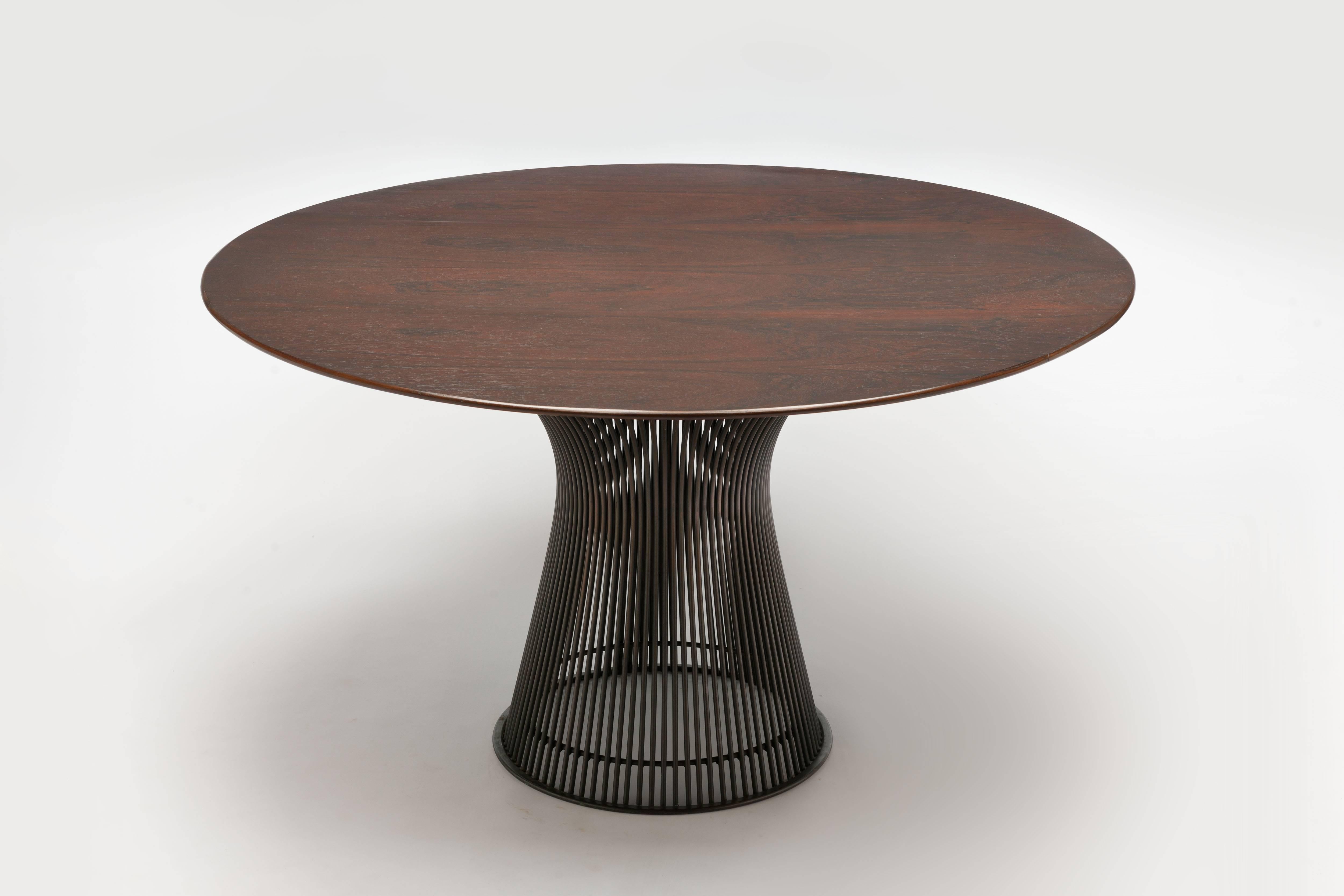 Rare bronze and rosewood wire series dining table by Warren Platner.
Early, 1960s Knoll production series with beautiful patine to the bronze base.
Lovely dark rosewood top with great wood grain structure.

NO OVERSEAS SHIPPING DUE TO RESTRICTED