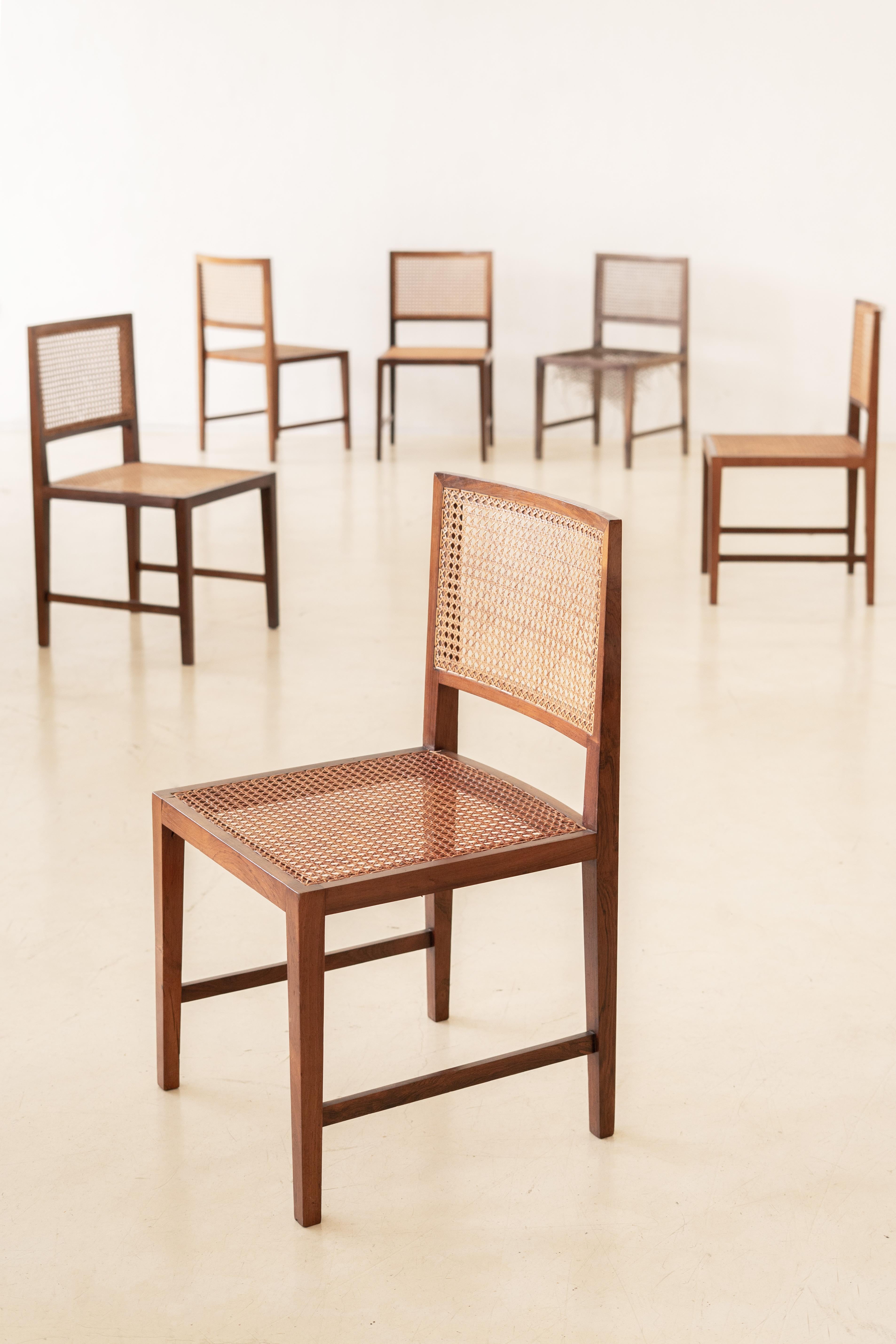 Mid-Century Modern Rosewood and Cane Dining Chairs, M.L. Magalhães, 1960s, Midcentury Brazilian en vente