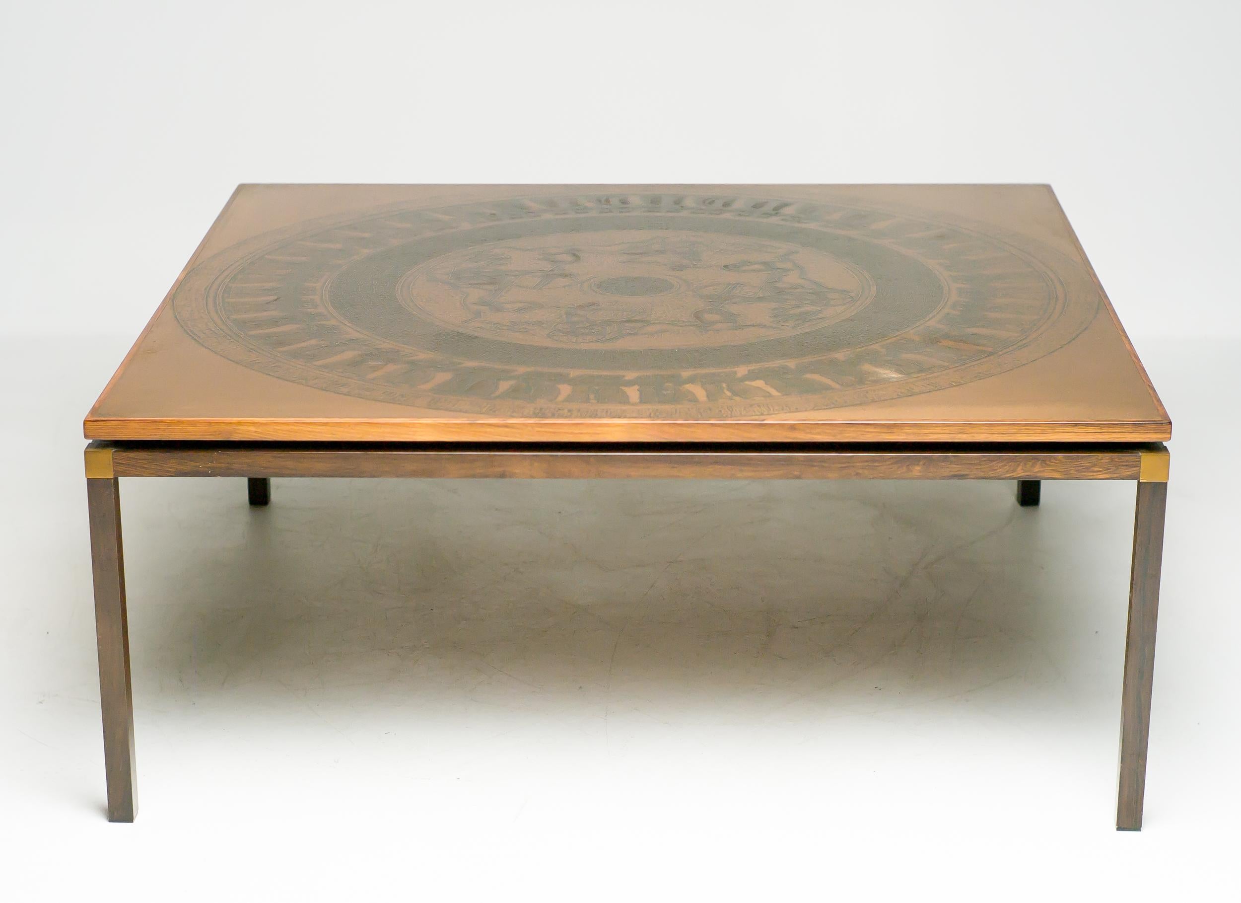Scandinavian architectural coffee table with embossed copper tabletop with ancient Egyptian Farao period decoration, rosewood and copper frame, Denmark, circa 1970.
  