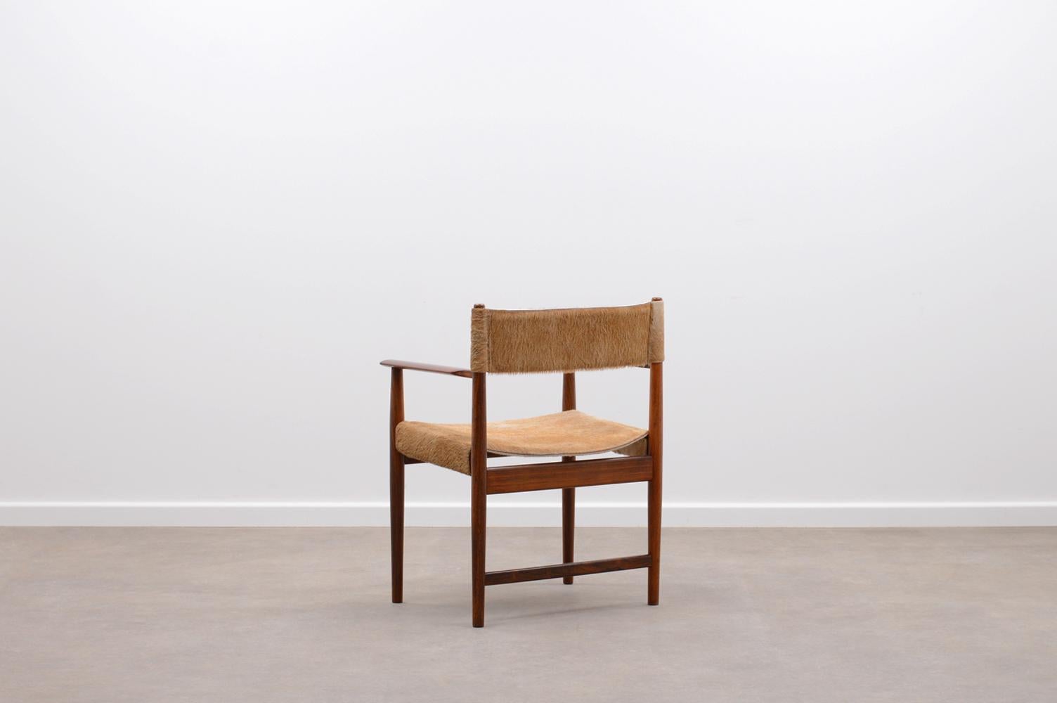 Danish Rosewood and Cow Hide Chair by Kurt Østervig for Sibast, 60s Denmark For Sale