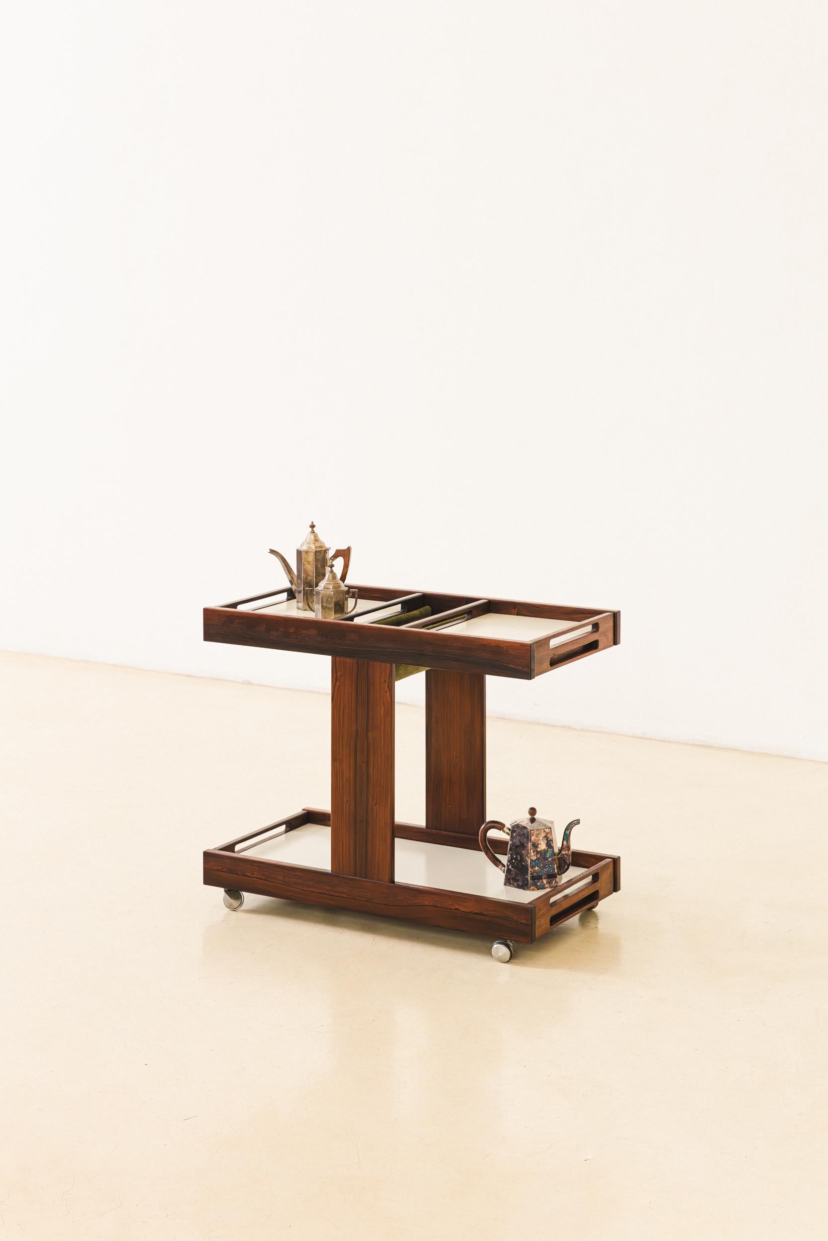 Produced in the 1960s by Celina Decorações, this Bar Cart is divided into two sections, both supported and connected by the same 