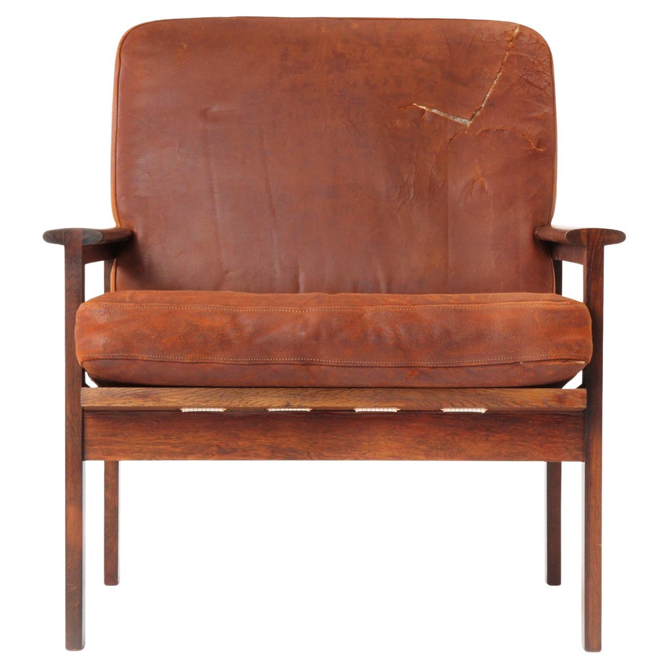 Fauteuil en bois de rose et cuir de Illum Wikkelso pour N. Eilersen