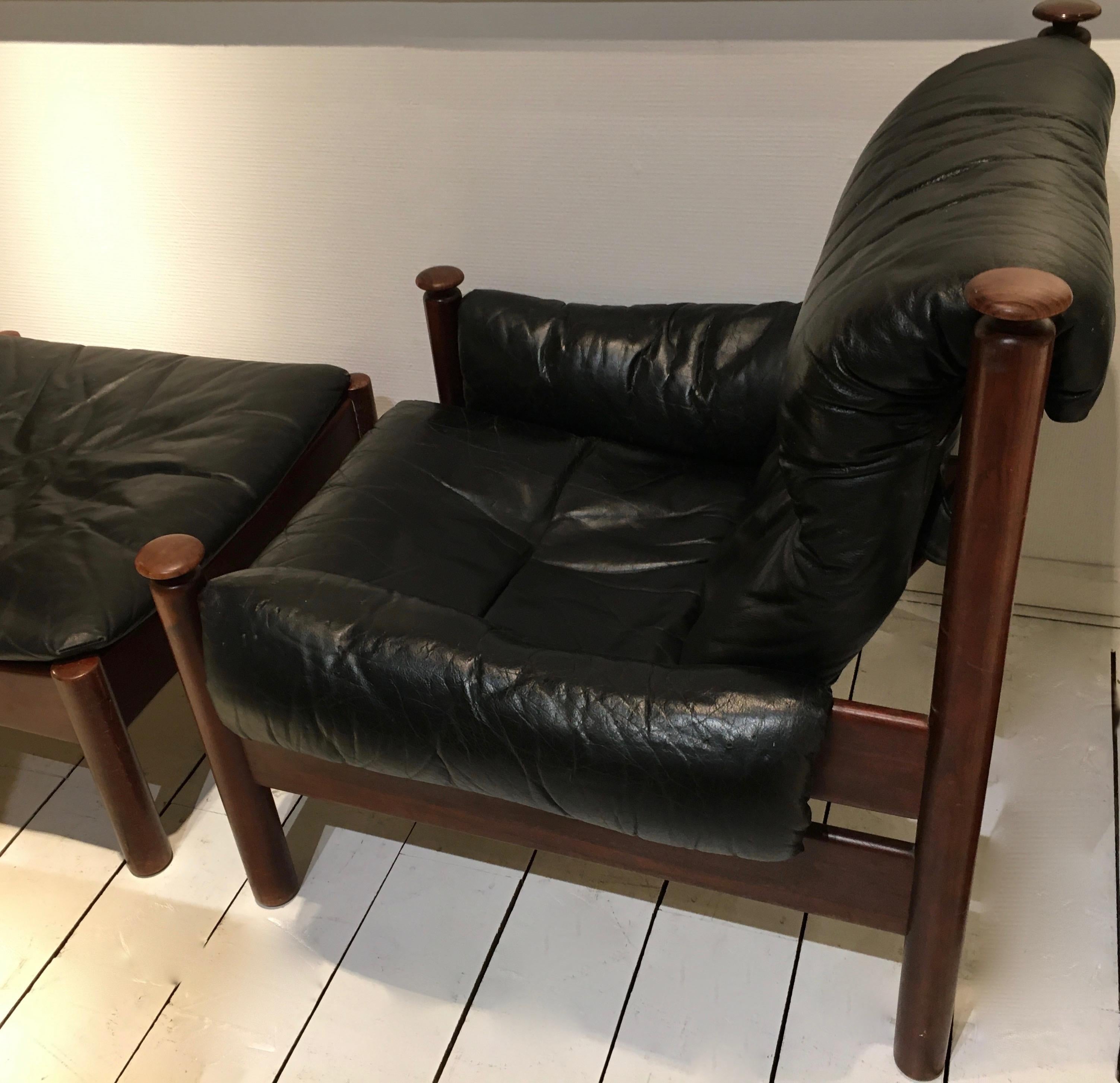 Mid-20th Century Teak and Leather Armchair and Ottoman by Eric Merthen, Sweden 1960.