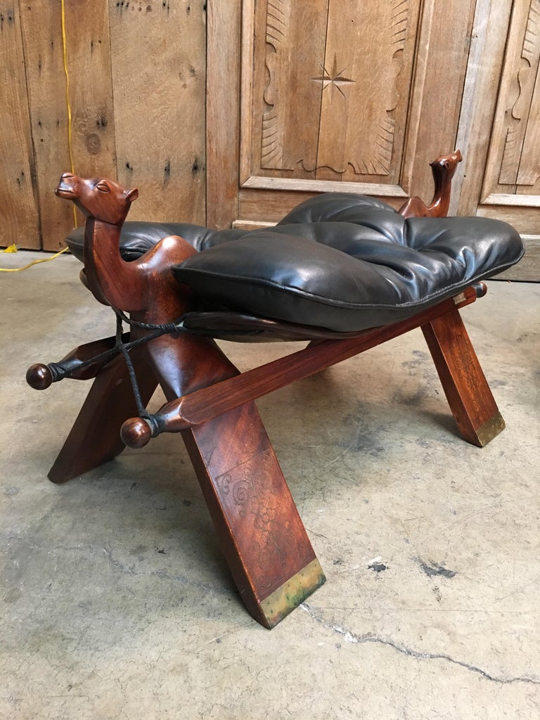 https://a.1stdibscdn.com/rosewood-and-leather-camel-saddle-stools-for-sale-picture-5/f_25383/1566339429235/IMG_1069_master.jpeg?width=768