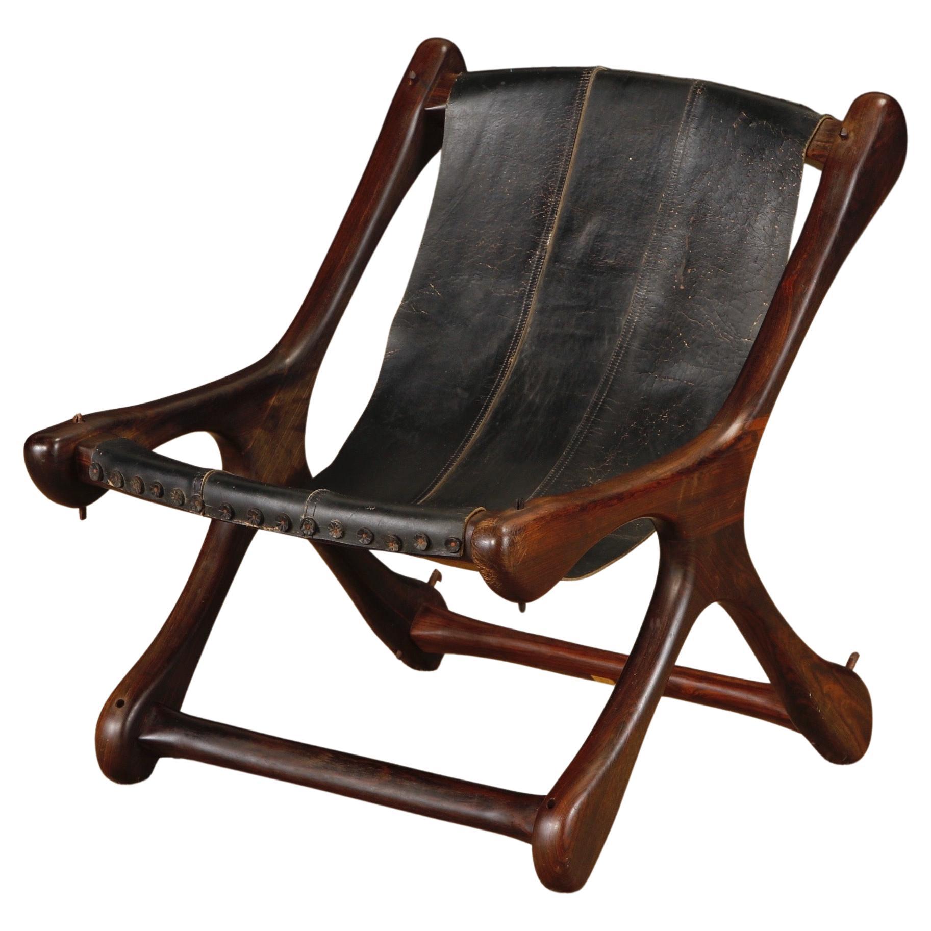 Chaise longue "Sloucher" en palissandre et cuir par Don Shoemaker, années 1960, signée
