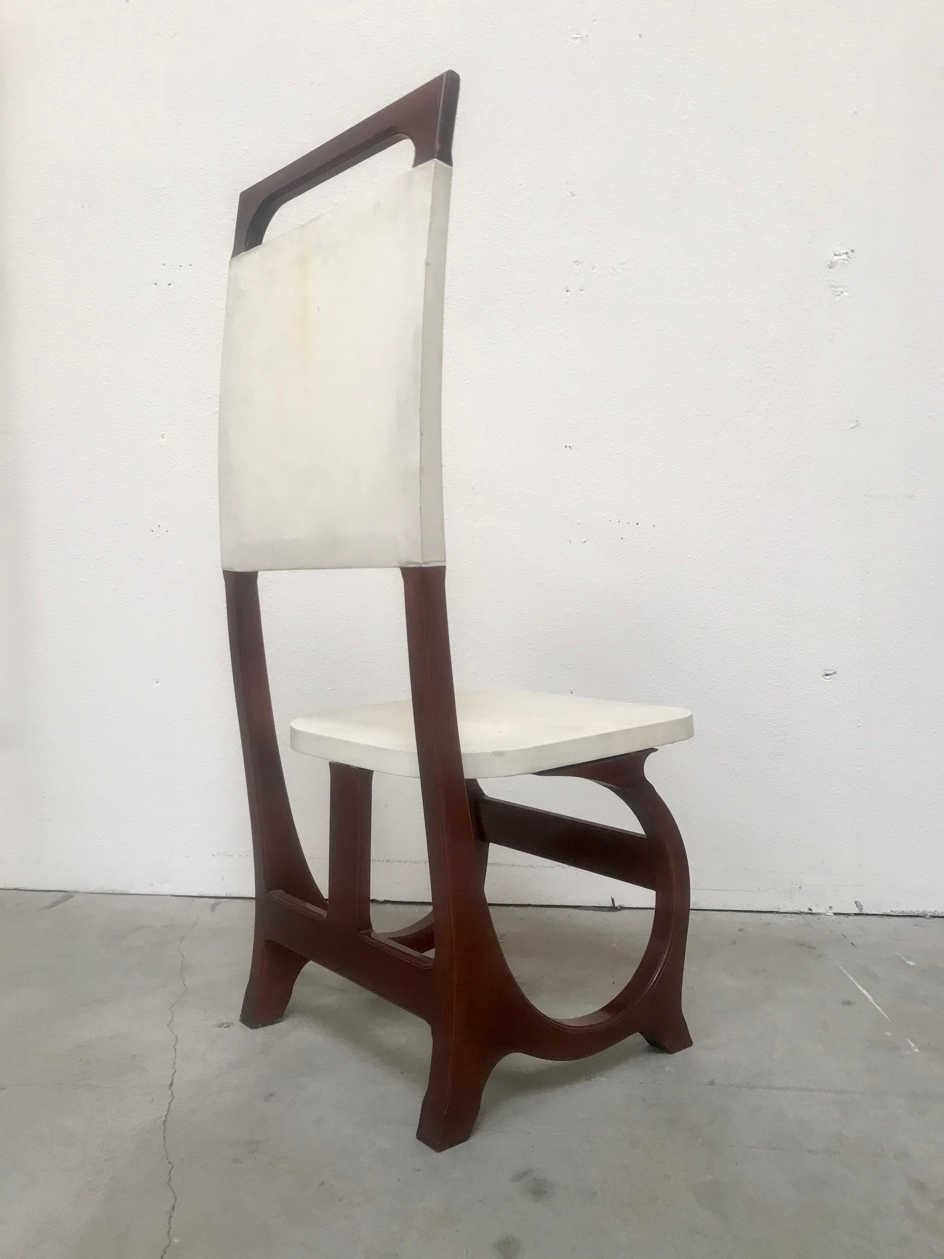Nice accent chair for any interior
Italian rosewood construction with parchment / leather seat and backrest
Original vintage condition showing minor ware / patina consistent with age
Solid and sturdy.
   