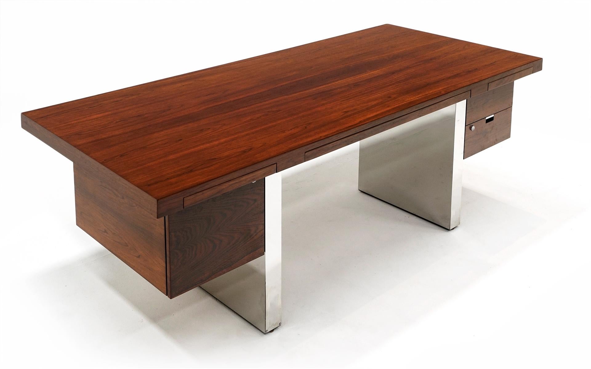 Mid-Century Modern Rosewood and Polished Aluminum Desk by Roger Sprunger for Dunbar.  Restored. For Sale