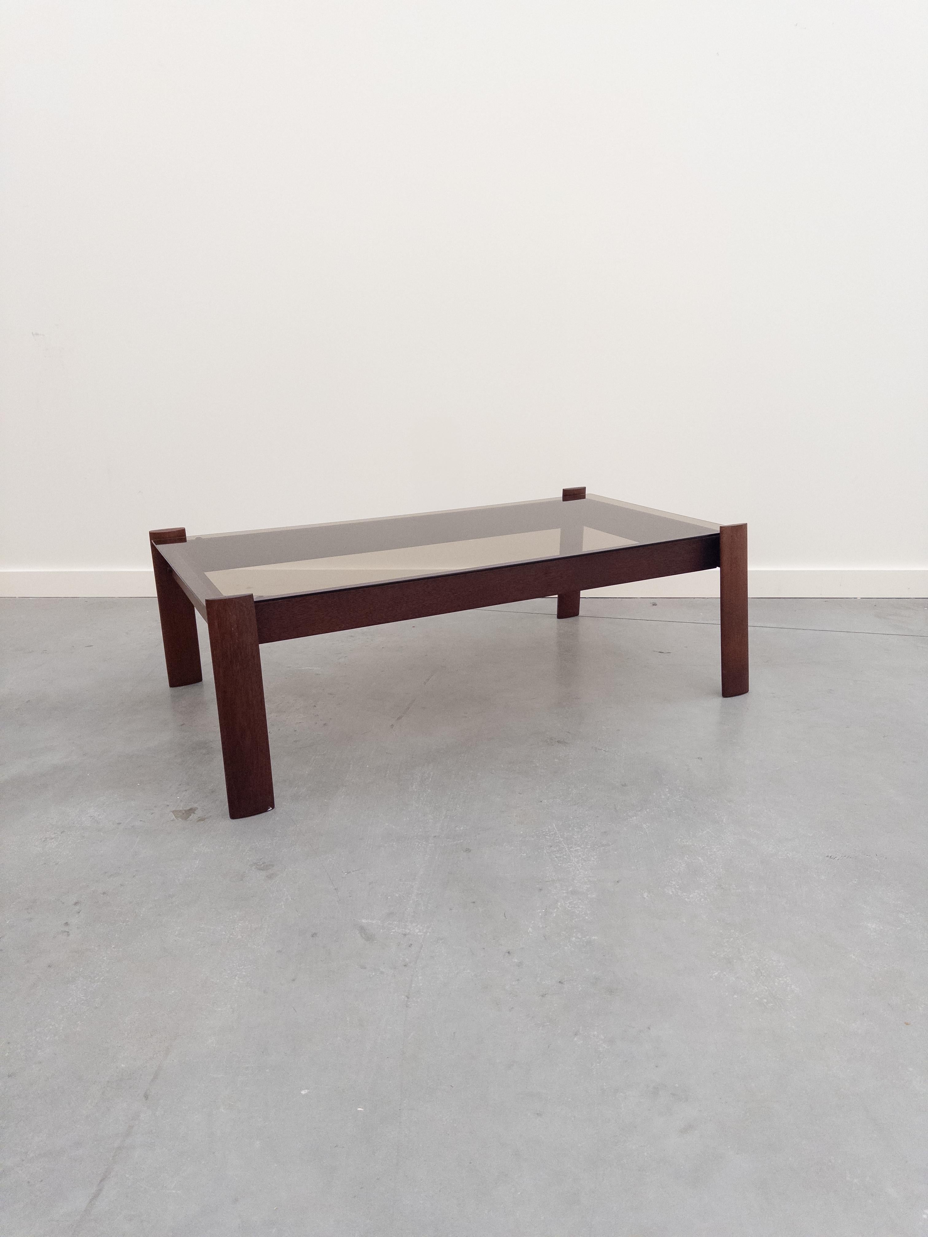 1960's Percival Lafer coffee table in Jacaranda Rosewood with original smoke glass top. Stamped Made in Brazil on underside.