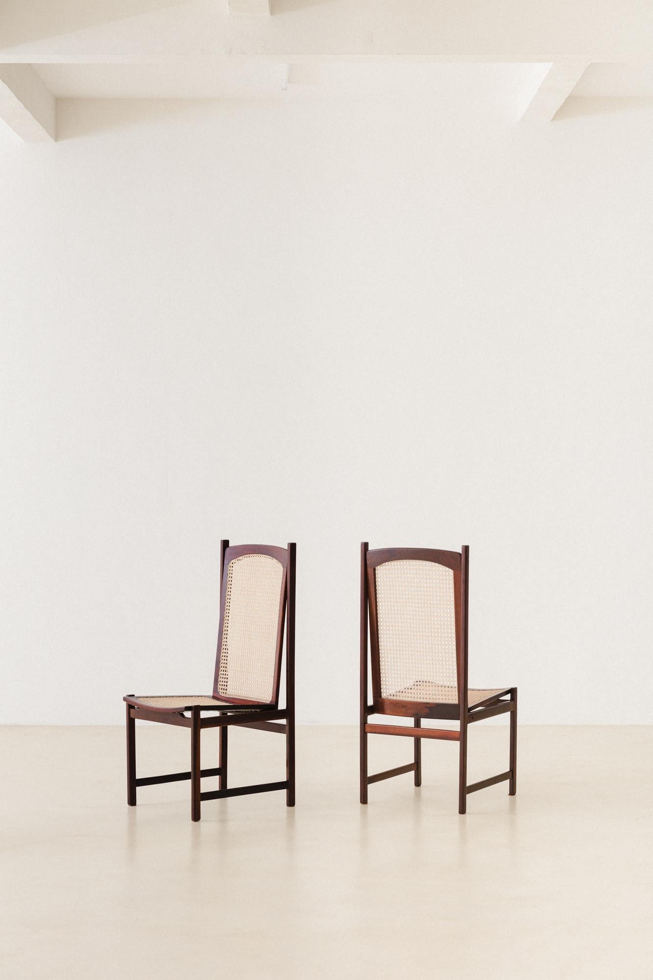 This gorgeous Rosewood and Cane Chair was designed and produced by the Brazilian company Fatima Arquitetura Interiores (FAI) in the 1960s. The pieces are composed of solid Rosewood, with large slats perfectly fitted.

Some details that are worth