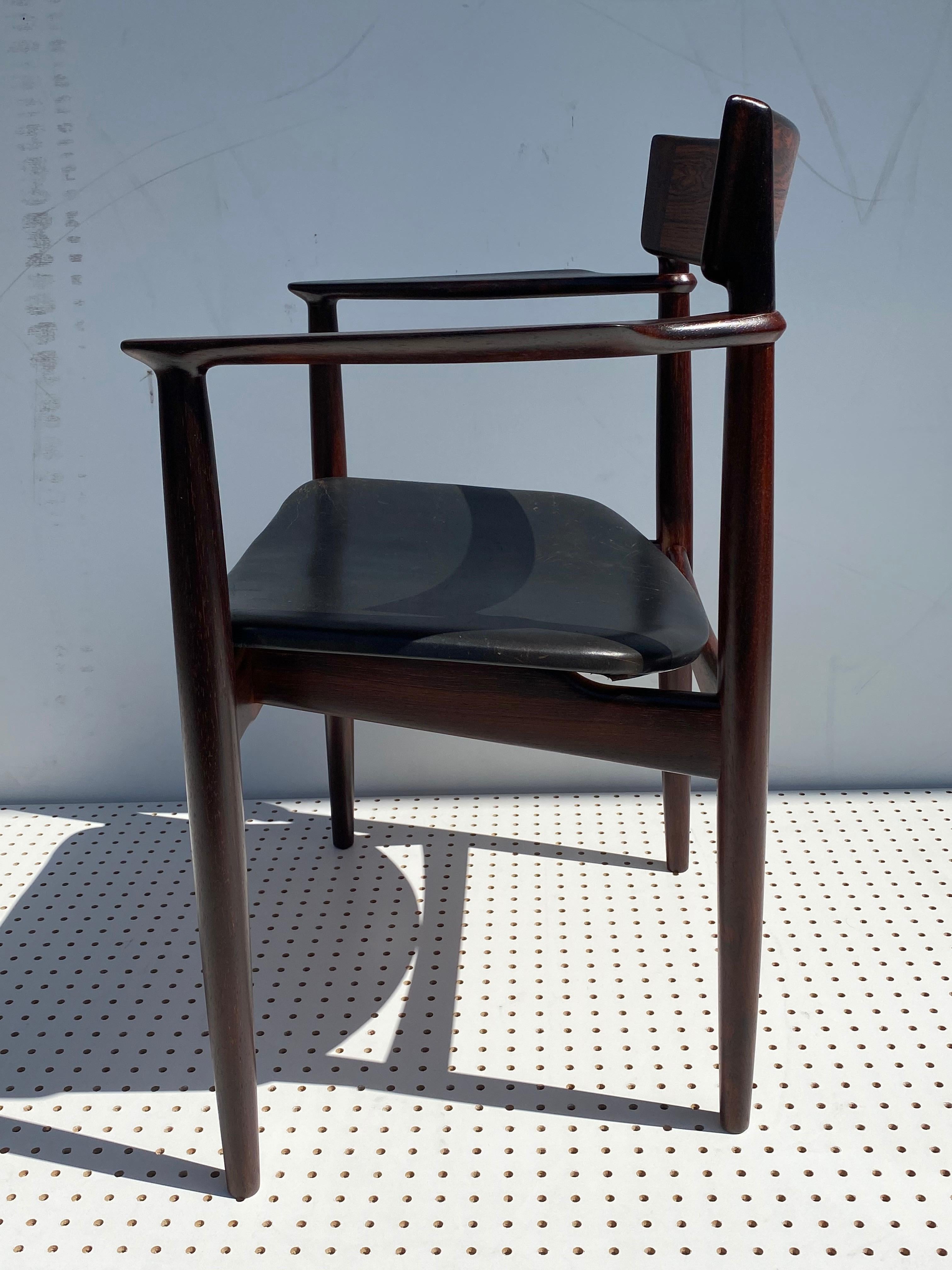 Danish Rosewood Armchair in Original Black Leather by Henry Rosengren Hansen For Sale
