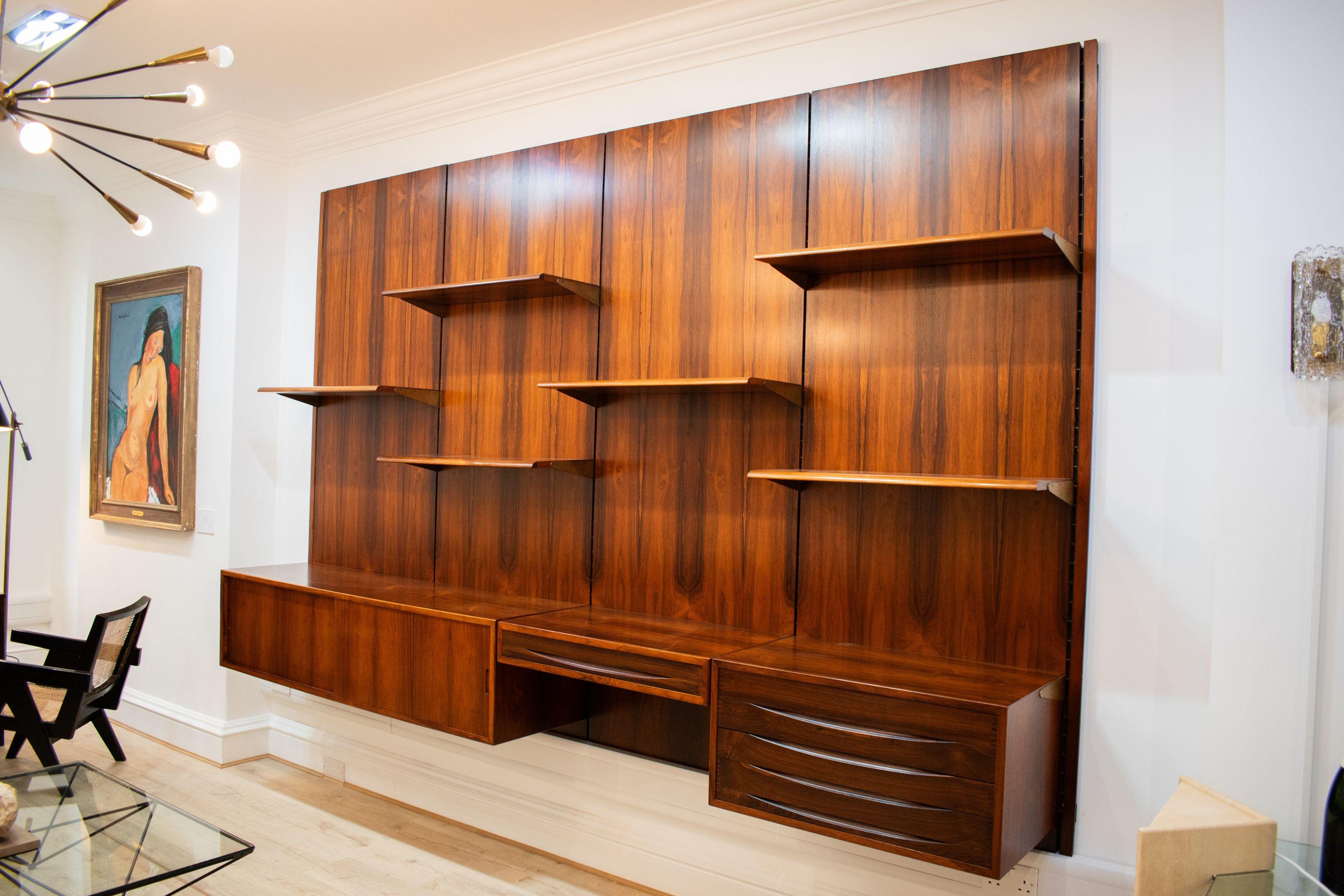 An exquisite Rosewood Bookcase/Wall Unit, designed by the renowned Danish architect and designer, Finn Juhl, and manufactured by Bovirke in the 1960s. 

This exceptional piece showcases the timeless craftsmanship and innovative design that made Finn