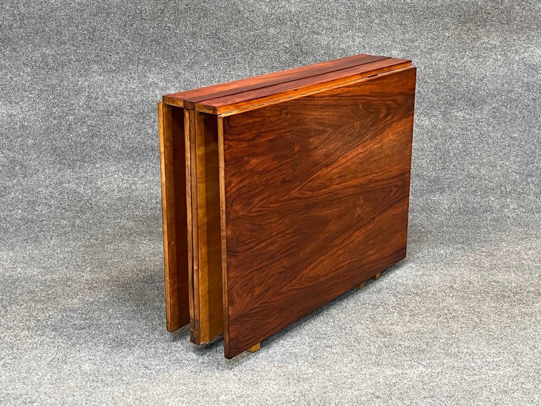 Rosewood Bruno Mathsson Maria folding dining table, Sweden, circa 1936

Rare Mid-Century Modern Bruno Mathsson Maria folding table crated in rosewood and made in Sweden. Amazing cleaver and versatile design that can be configured in numerous