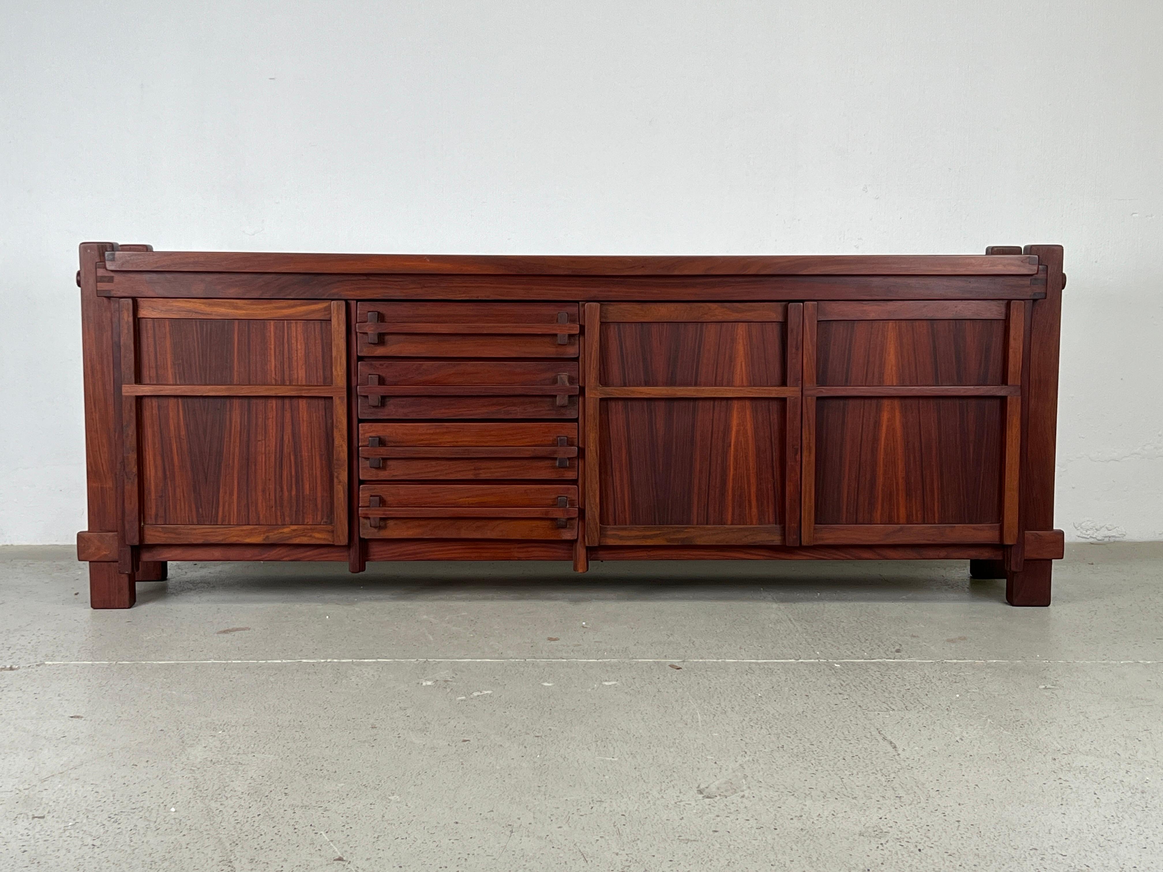 A beautifully detailed and well constructed solid rosewood credenza. 