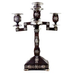 Rosewood candelabra with silver applications and four arms on square bases