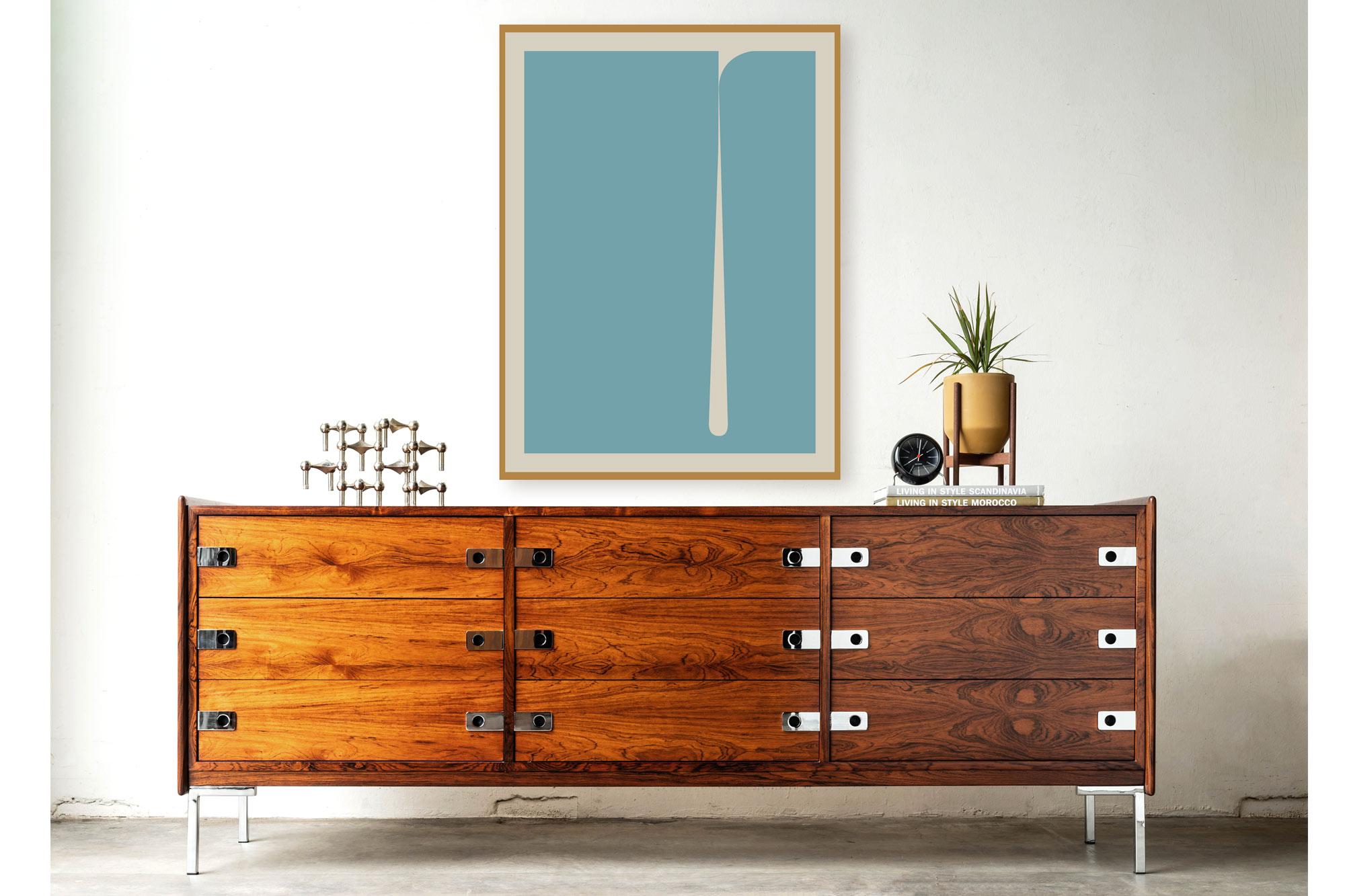 Indulge yourself in the luxurious beauty of this rosewood and chrome triple dresser, crafted in the manner of the renowned designer Arne Vodder. With its stunningly grained rosewood exterior and polished chrome accents, this piece is truly a