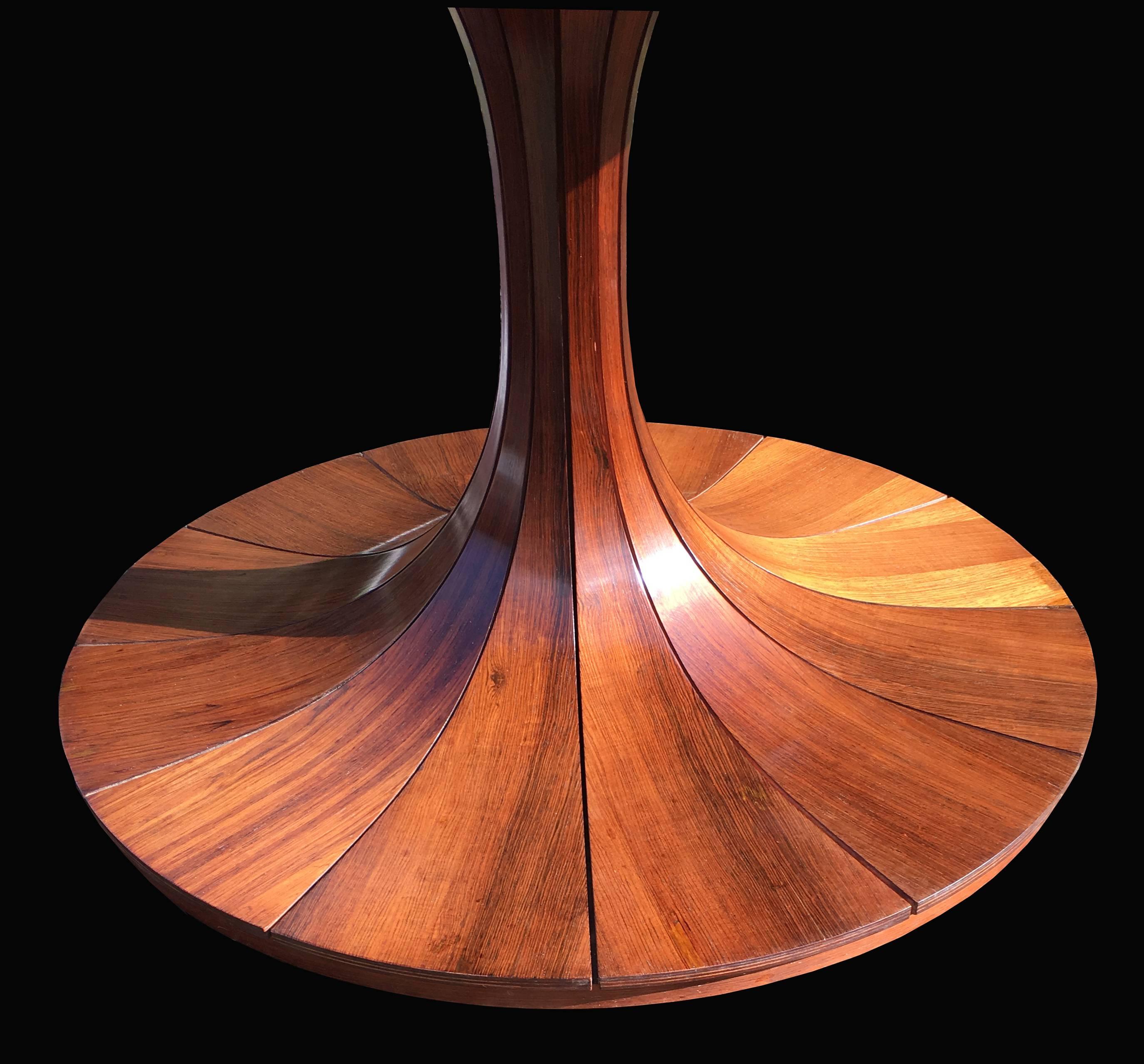 Absolutely spectacular rosewood dining or centre table by the influential designer Luigi Massoni. You may find slightly less expensive versions of this piece, but almost certainly not as good!
We will let the photos speak for themseles, there are