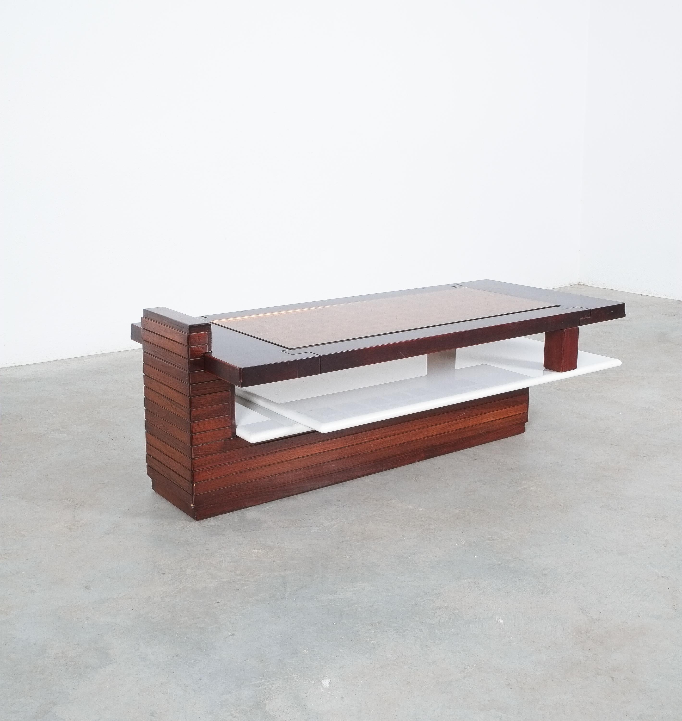 Bespoke solid wood and rosewood and marble coffee table, Brazil, 1970

One of a kind very heavy table made from a solid rosewood tray with an inlaying orange glass top and a solid underlaying marble tray. Unusual design executed with great