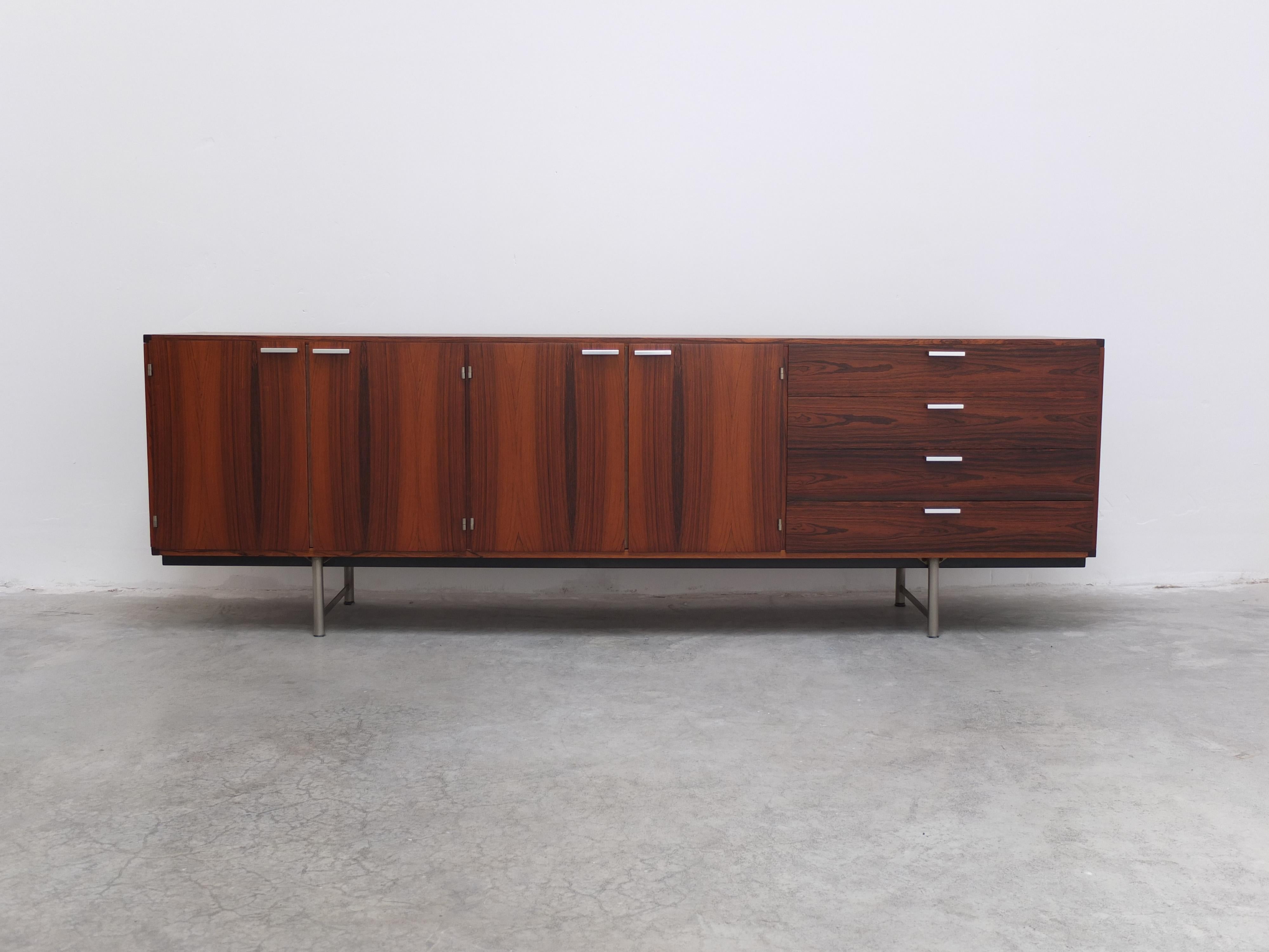Modernist sideboard designed by Cees Braakman for Pastoe during the 1960s. This model is part of the famous CR or Made to Measure series and is finished in beautiful Rosewood with a fantastic wood grain. Fully restored in perfect condition.