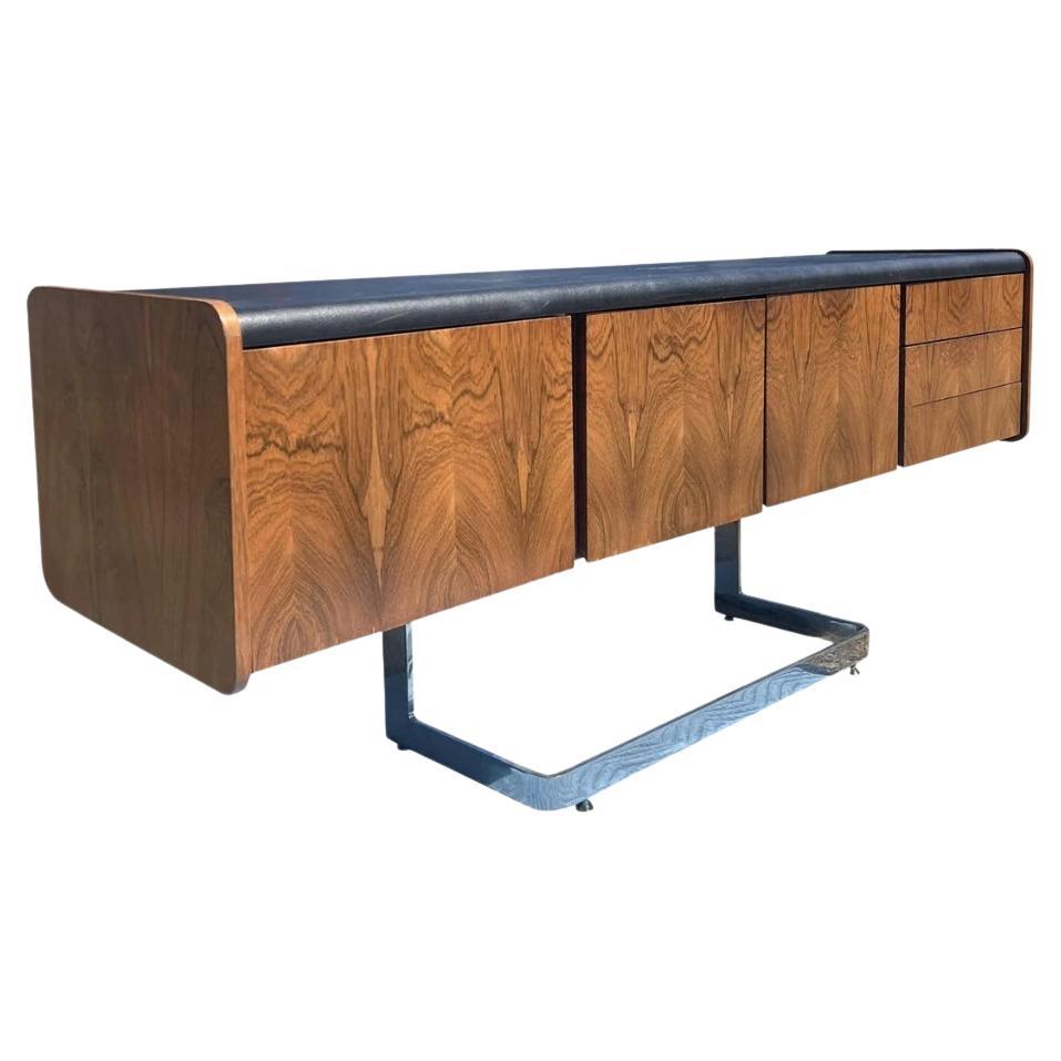 Credenza in palissandro di Ste. Marie e Laurent in cromo e top in pelle