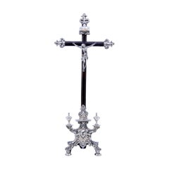 Rosewood crucifix with silver Jesus and Christian symbols on three feet