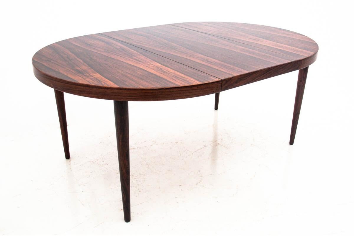 Design table by Kai Kristainsen, Denmark, circa 1960.
After renovation
Wood: Rosewood
Dimensions: Height 72 cm, width 116 cm, length after unfolding 171 cm.

  