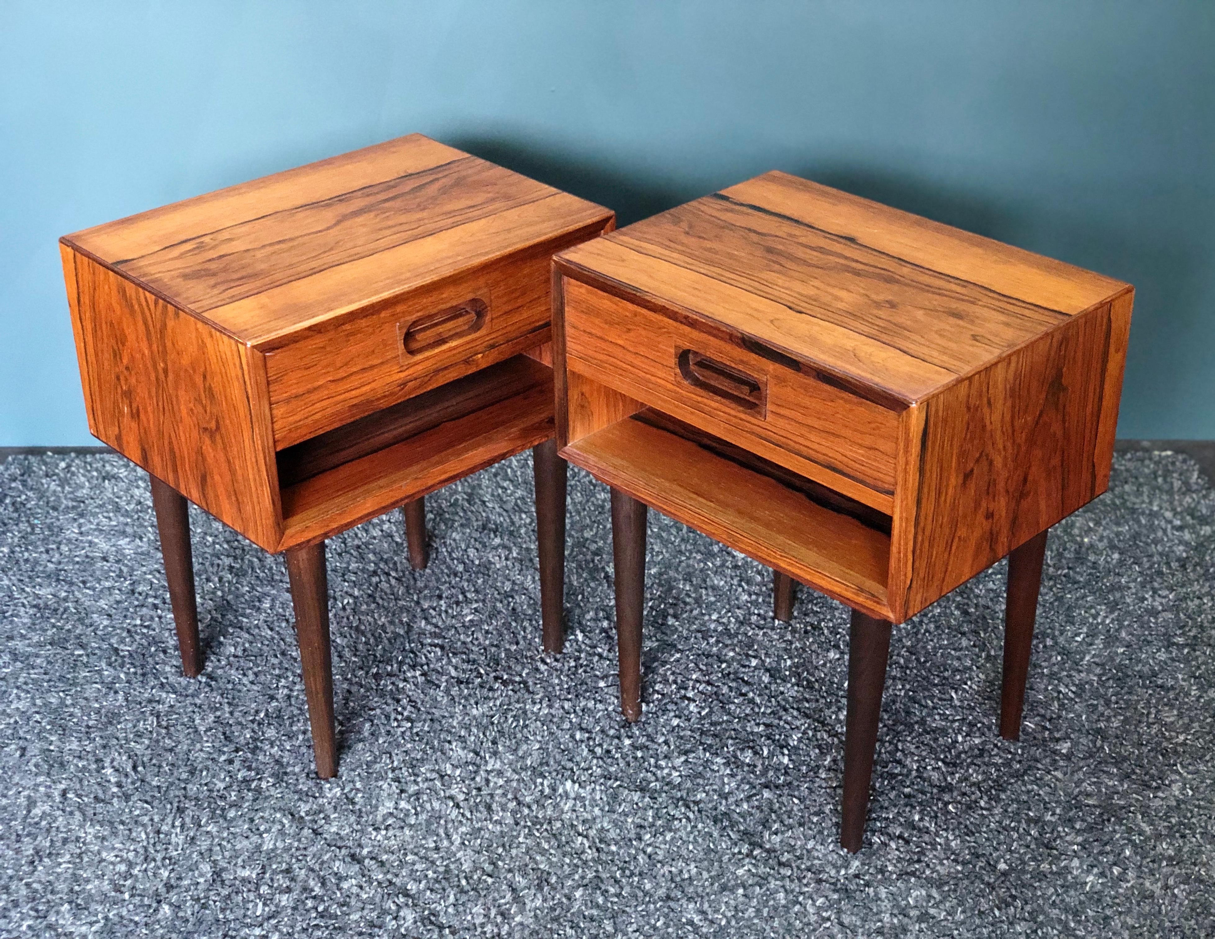 A matching pair of Danish rosewood midcentury nightstands by Dyrlund. Produced in Denmark circa 1960. These bedside drawers are perfect Midcentury design and extremely practical.
Cleaned and re-oiled.