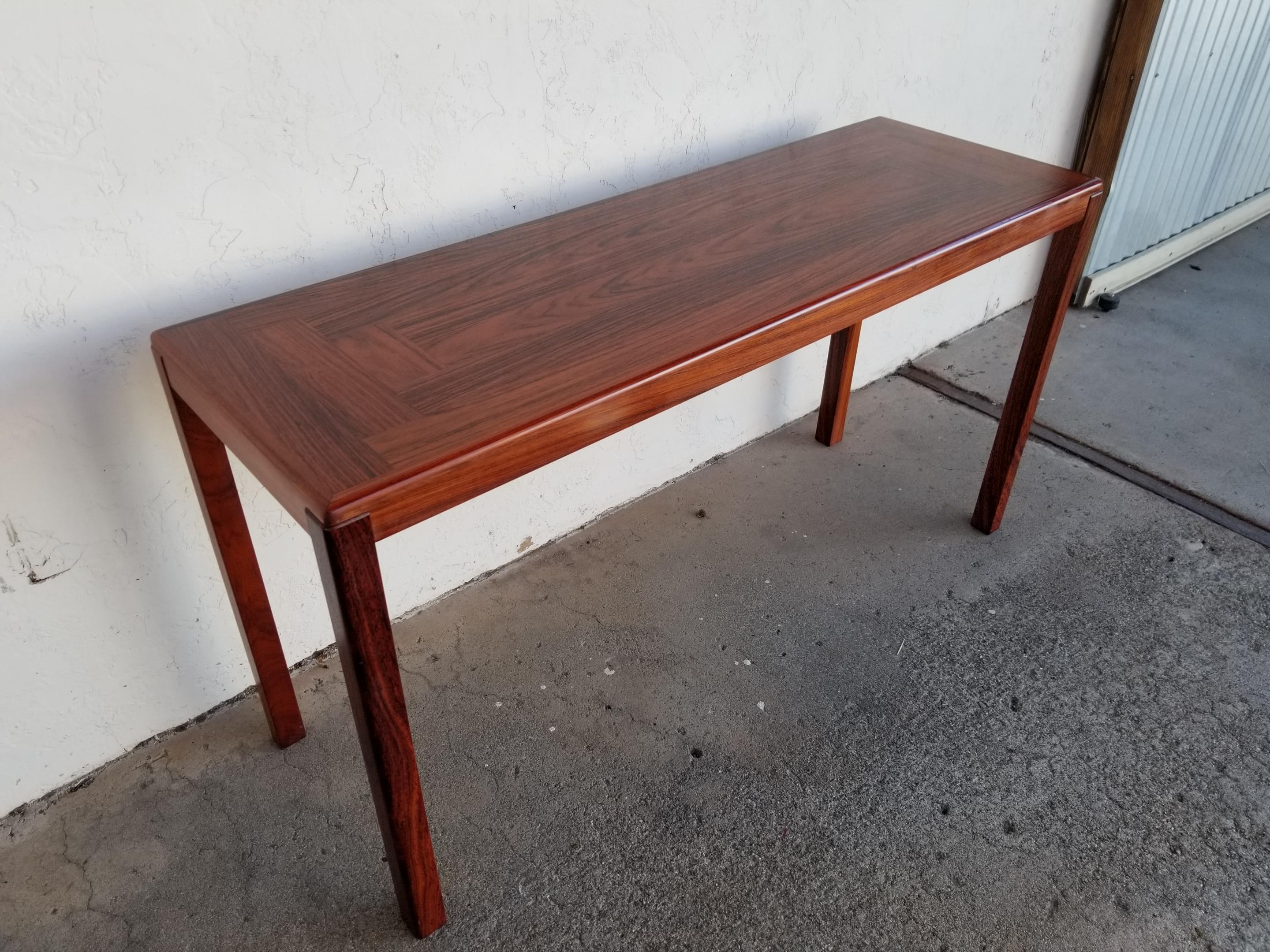 Beautiful Vejle Stole rosewood console table with rectangular parquet top. Solid rosewood legs. Made in Denmark, circa 1970. Makers mark stamped on underside. Very good vintage condition with original finish. Age appropriate wear with various