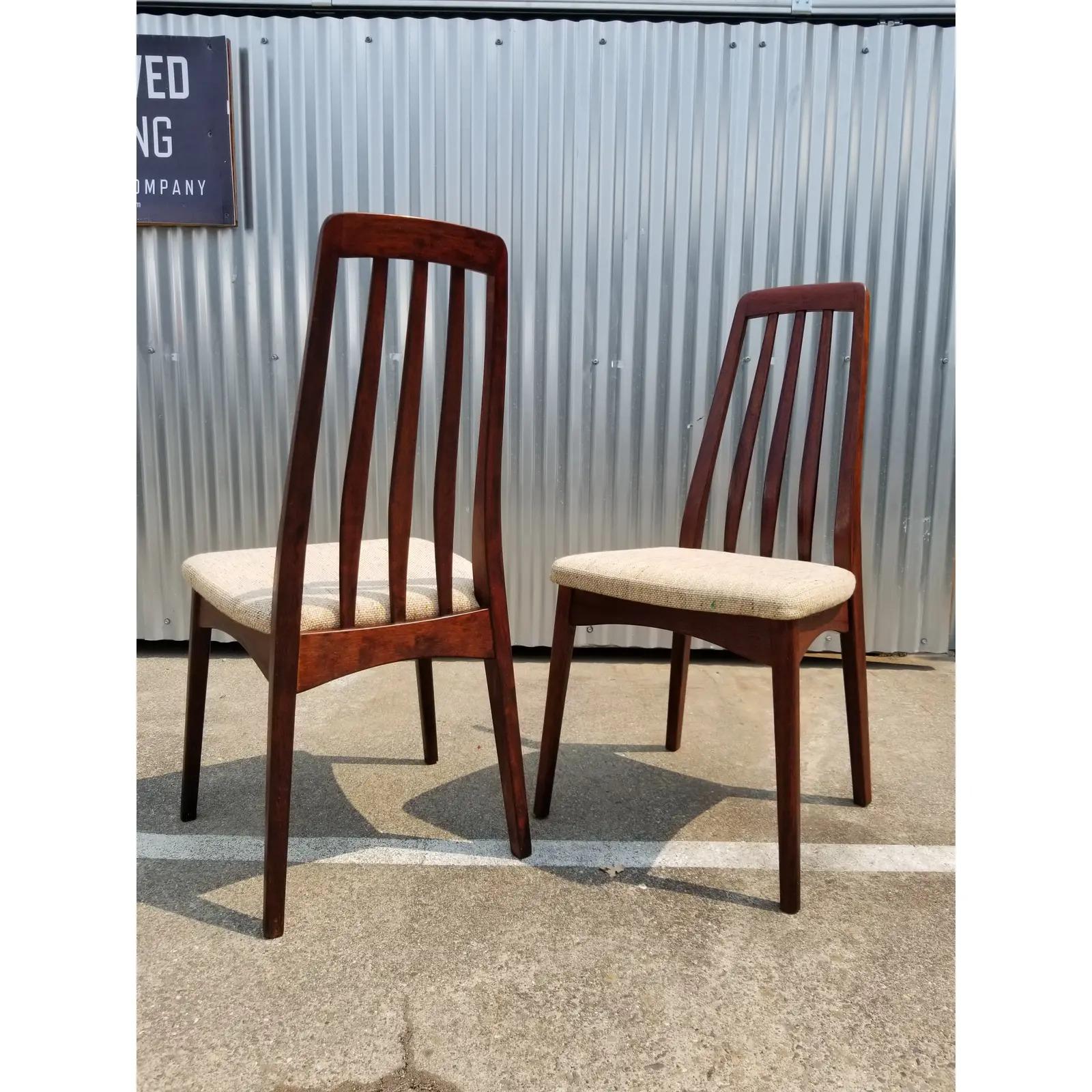 A pair of rosewood high back dining chairs by Svegards Mobelfabrik, Sweden, circa 1970s. The superior craftsmanship creates a very sturdy and structurally solid chair. Sculptural high back design adds comfort.