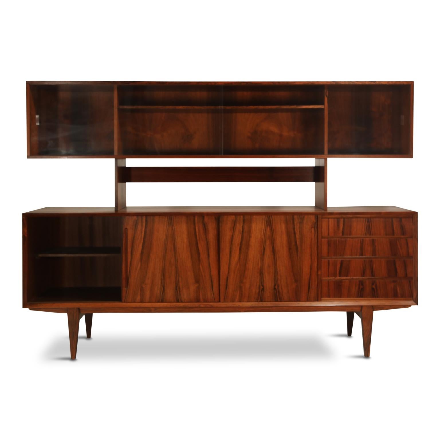 Incredible rosewood grain on this Danish modern sideboard and hutch by Peter Lovig Nielson, and retailed by Maurice Villency, signed on the back with makers mark and retailer label on an inside drawer. Normally this design is found in teak,