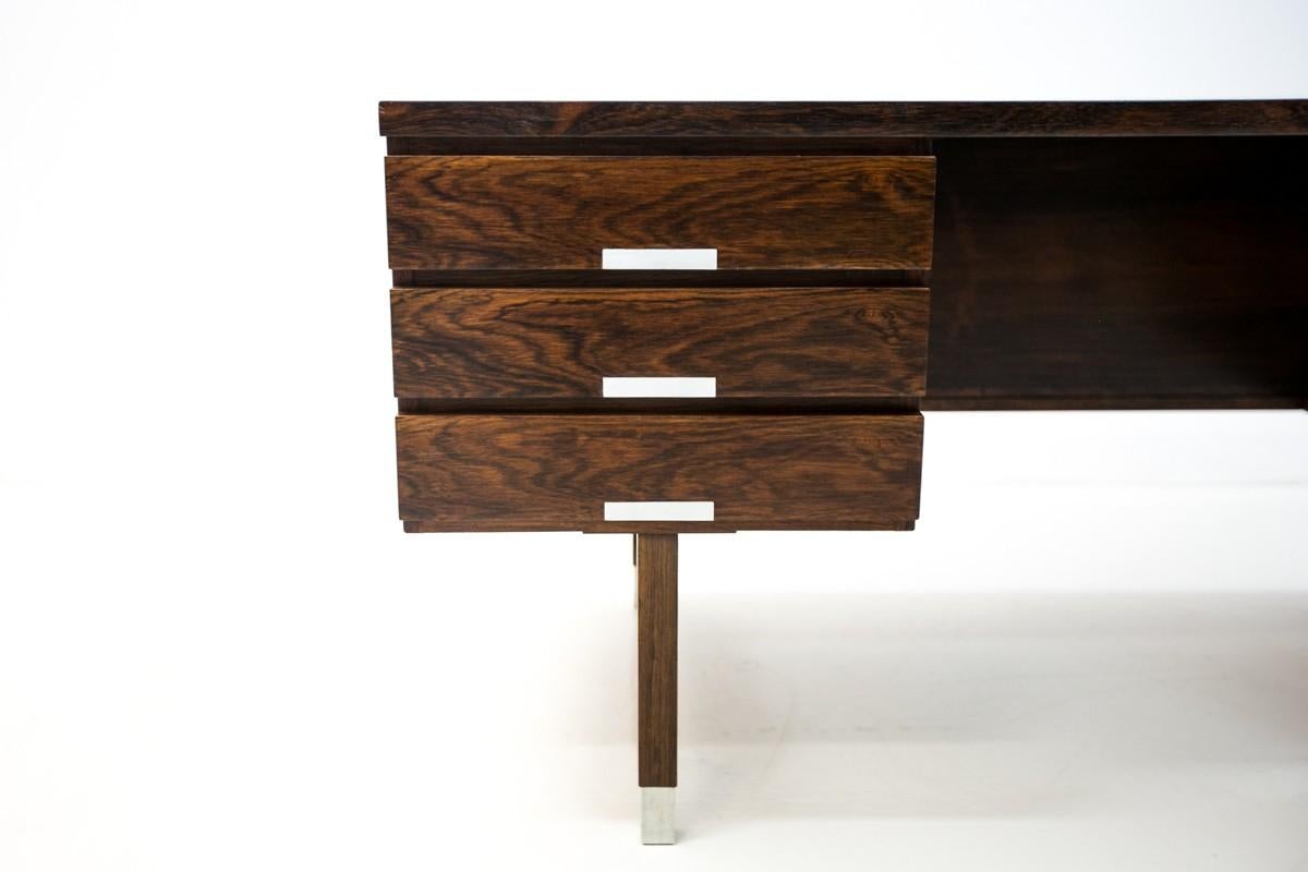Rosewood iconic desk by Kai Kristiansen from the 1960s, originating in Denmark. Furniture in very good condition, after professional renovation.