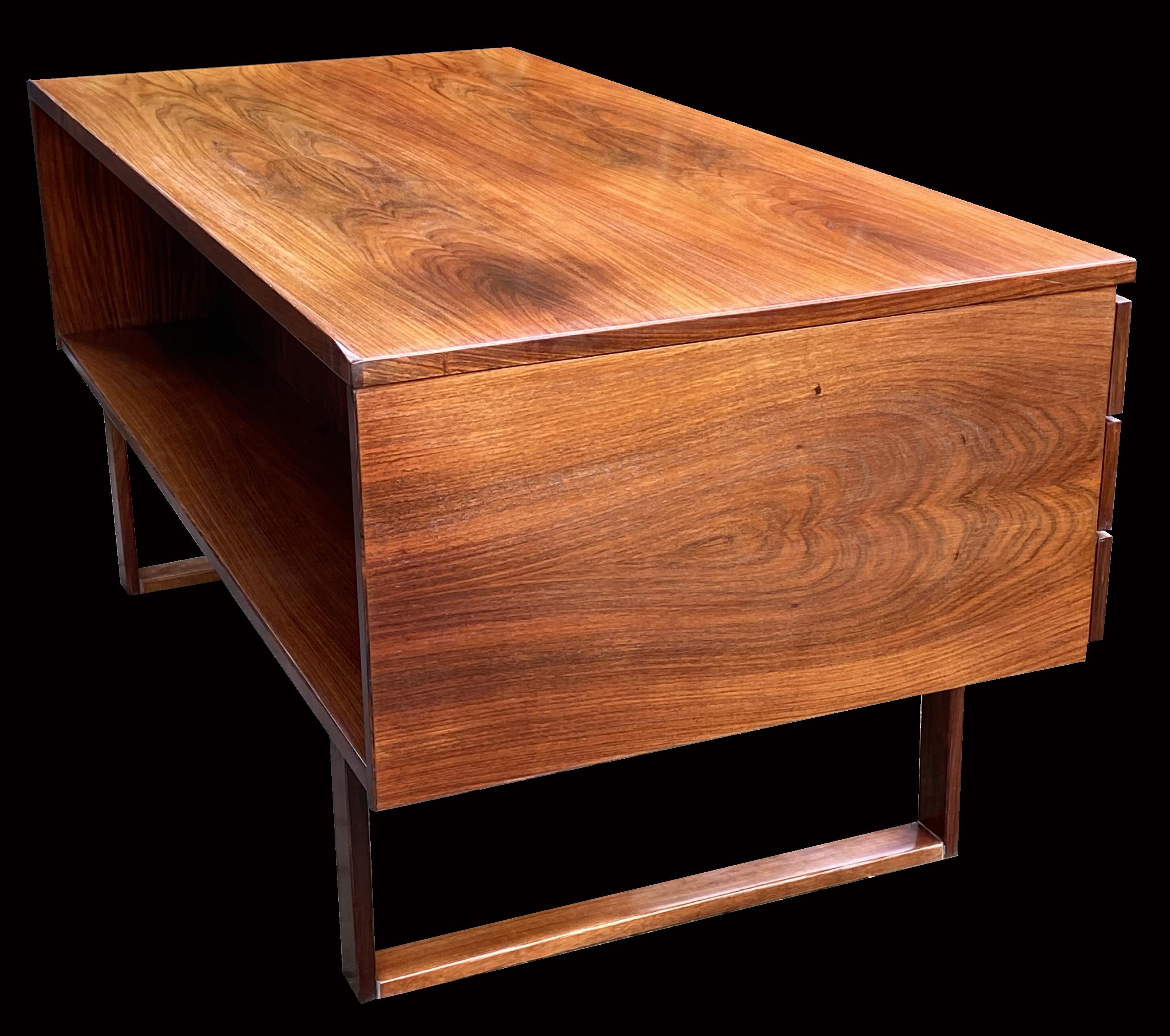 A very nice classic Scandinavian Modern Santos rosewood desk.
Santos rosewood (Machaerium Scleroxylon) is not on the Cites list, so there is no problem with import or export.