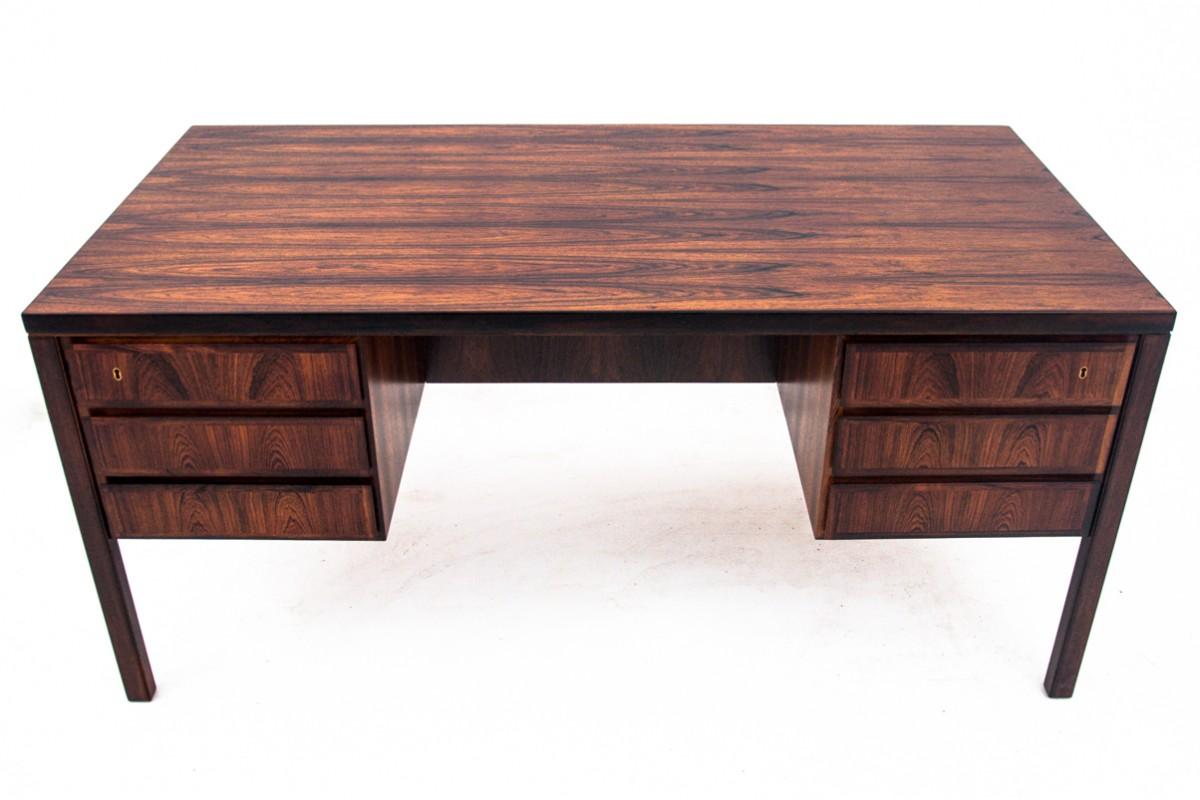 Natural brown with beautiful graining rosewood midcentury modern desk, made in Denmark in the 1960s by Omann Jun Mobelfabrik. 
Classic Danish design, timeless exclusive vintage style.
Furniture in very good condition, after professional