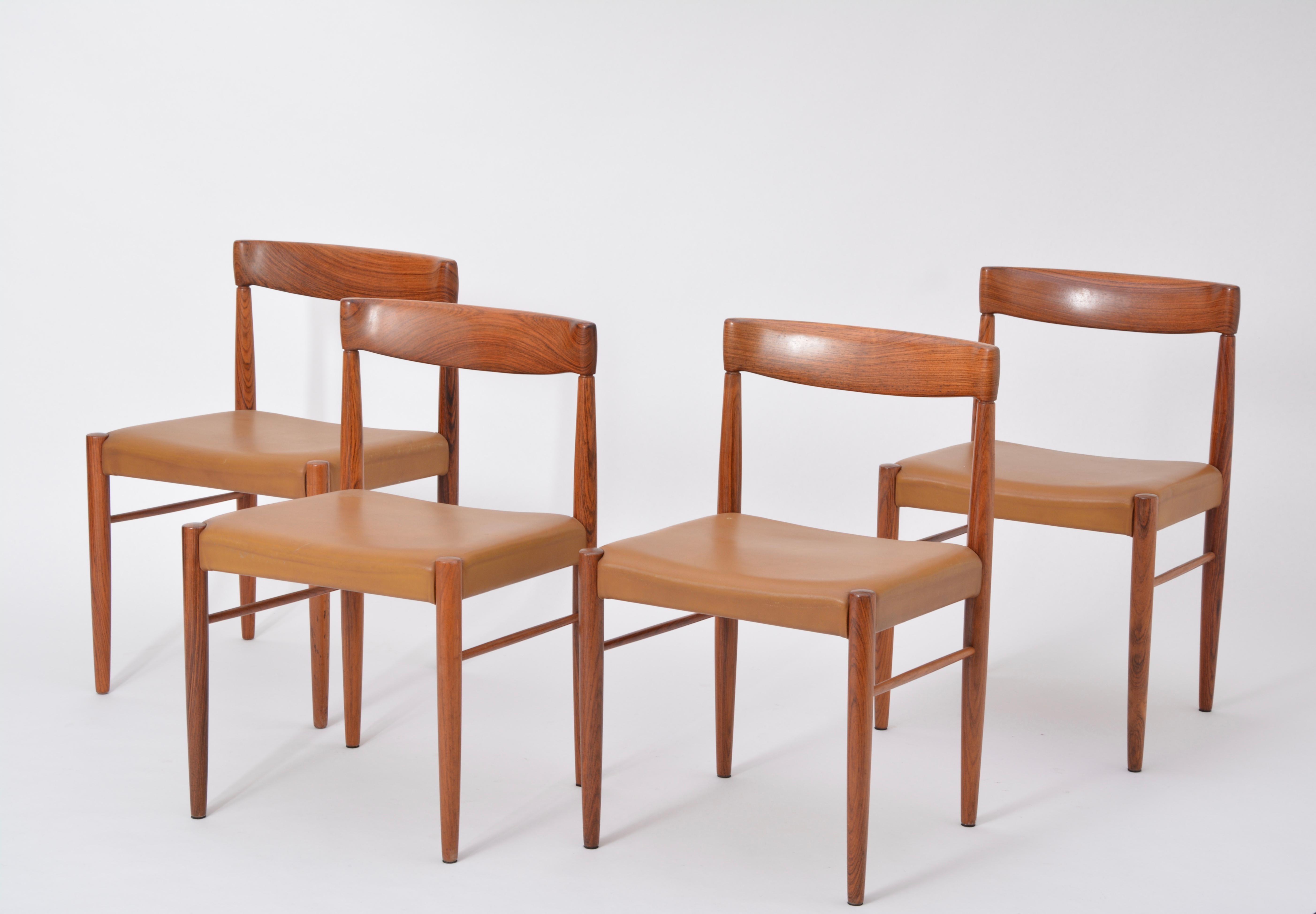 These dining chairs were designed by H. W. Klein and manufactured by Bramin in the 1960s in Denmark. The frames are made of rosewood and the seats are upholstered in light brown leather. Two sets of four chairs available.