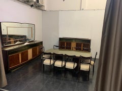 Rosewood Dining Room Set with Finely Carved Panels by Vittorio Dassi