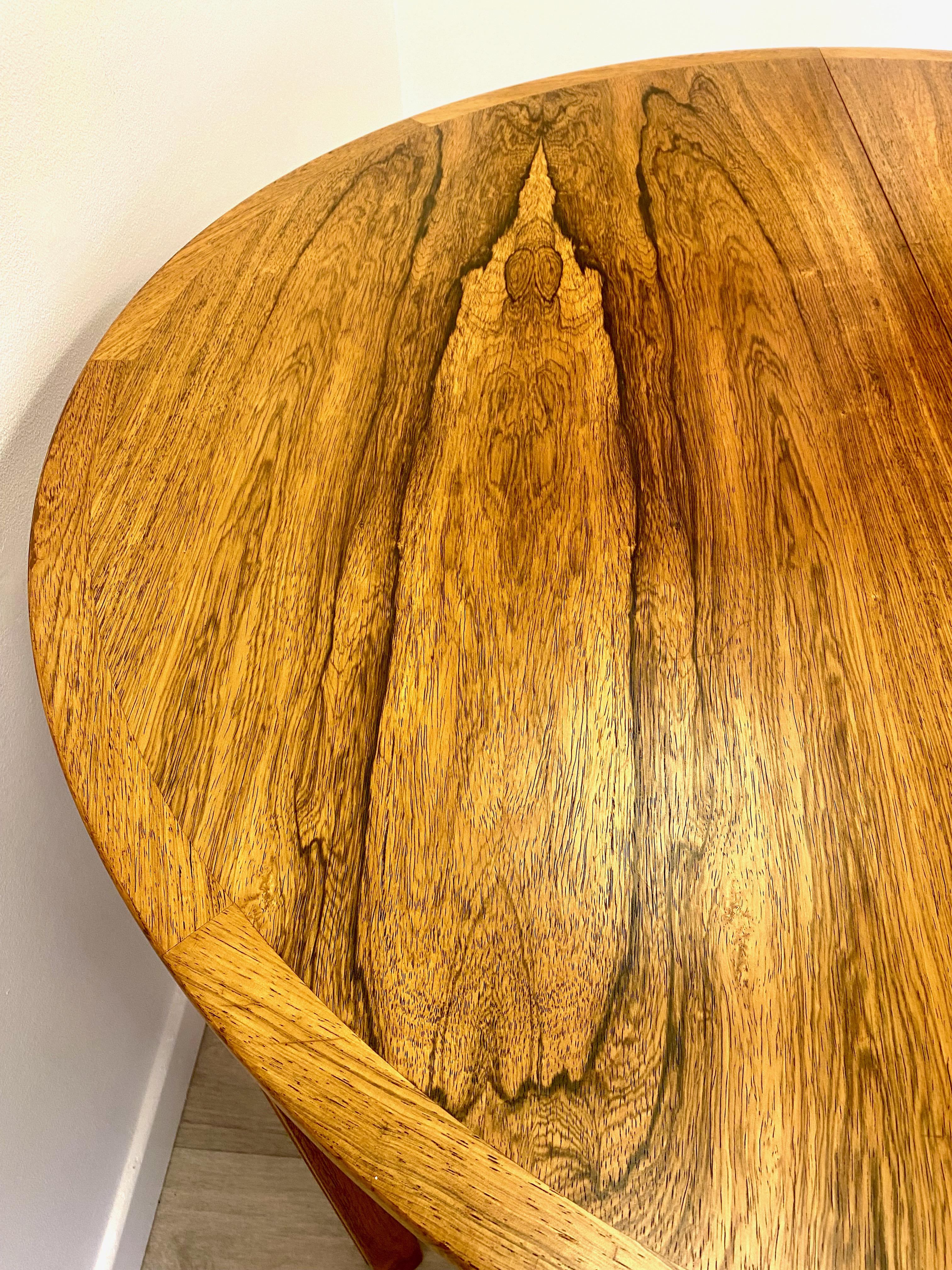 Swedish Rosewood dining table by Bertil Fridhagen