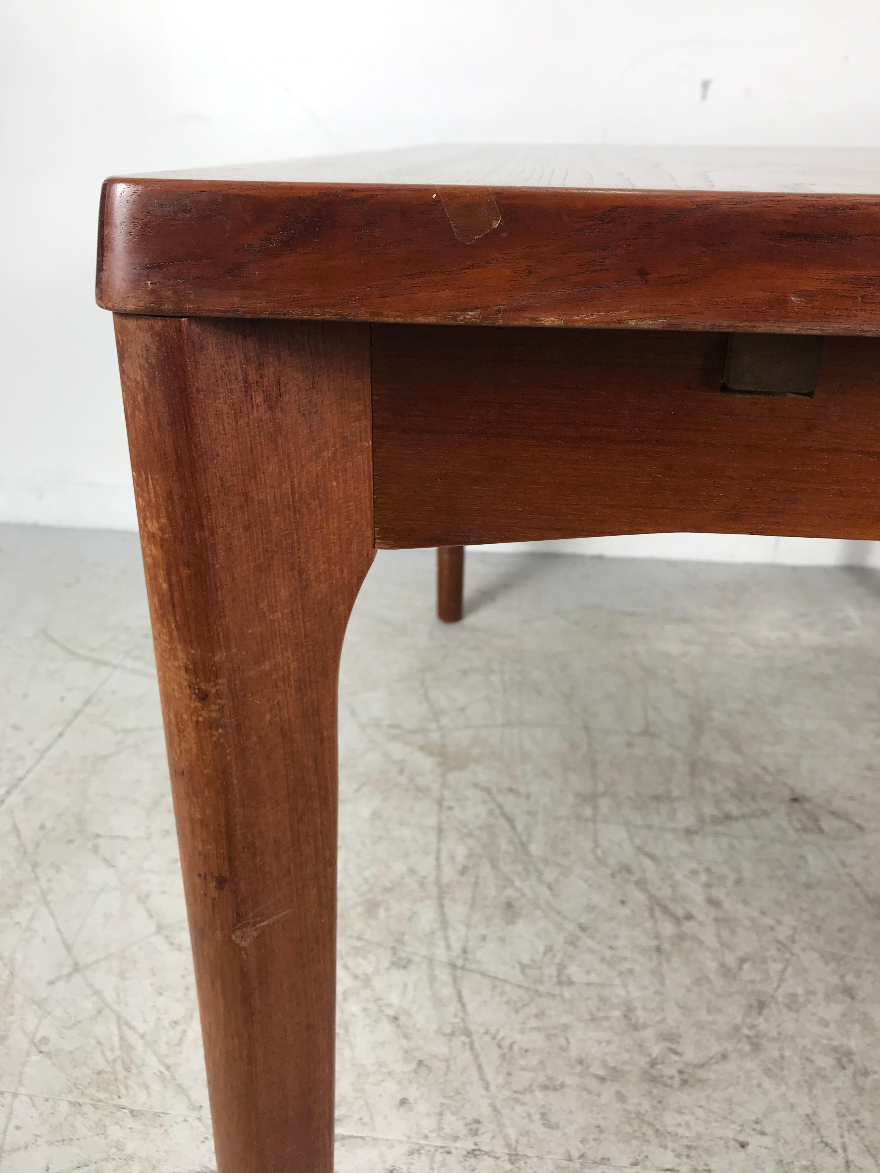Danish modernist design extendable dining room table /desk in rosewood
The extension leaves are nicely integrated into the design, stored under the tabletop, so that the table is both folded and unfolded nice to look at.
Special about this table