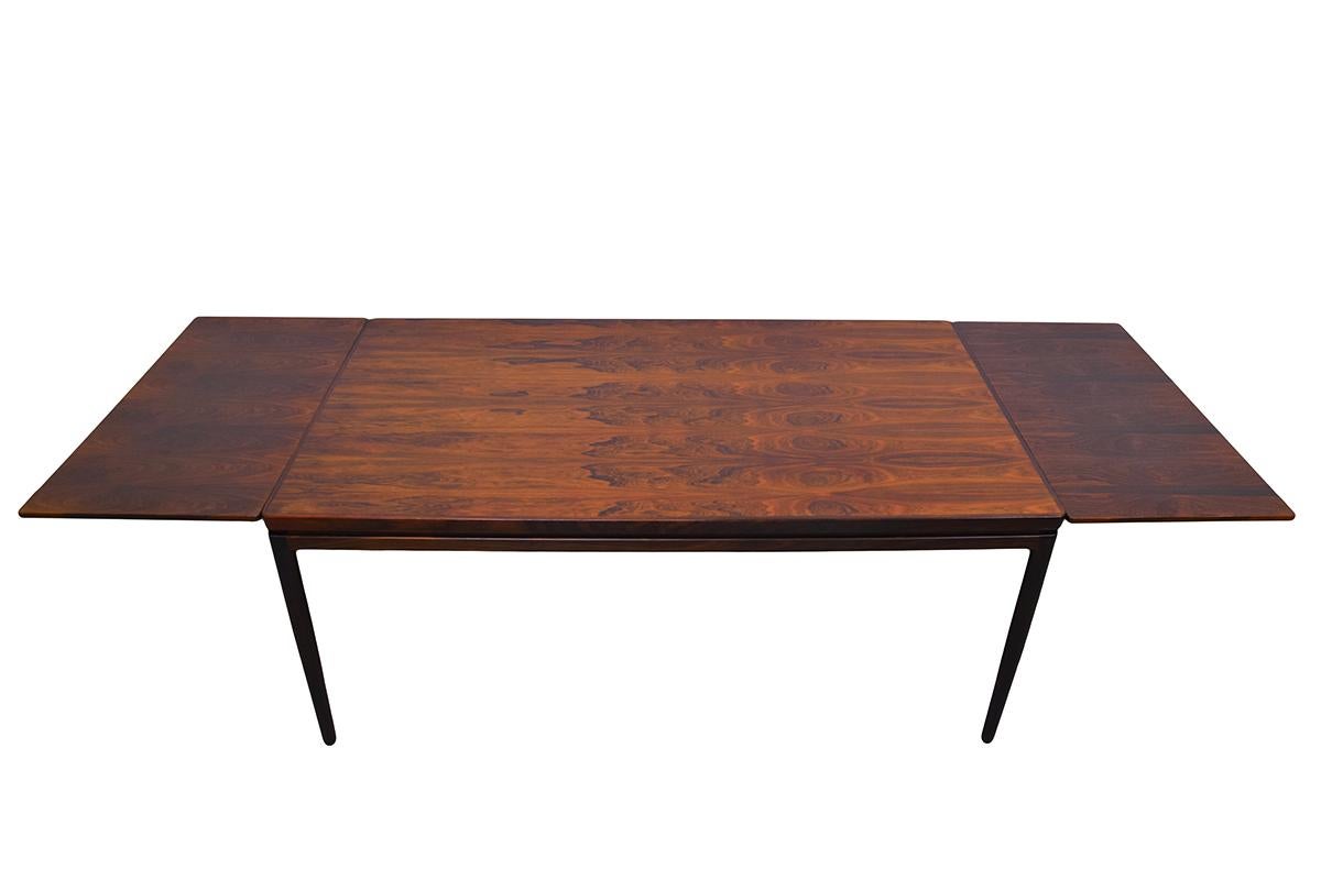 Mid-20th Century Rosewood Dining Table by Johannes Andersen for Christian Linnebergs Möbelfabrik