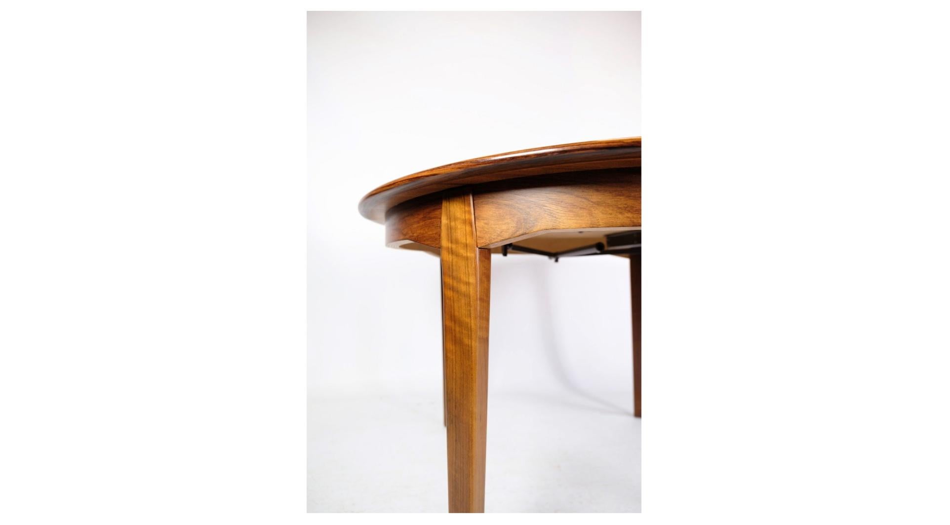 Mid-Century Modern Table de salle à manger en bois de rose conçue par Johannes Andersen à partir des années 1960 en vente
