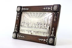 Rosewood frame surrounding the Last Supper in silver with applications