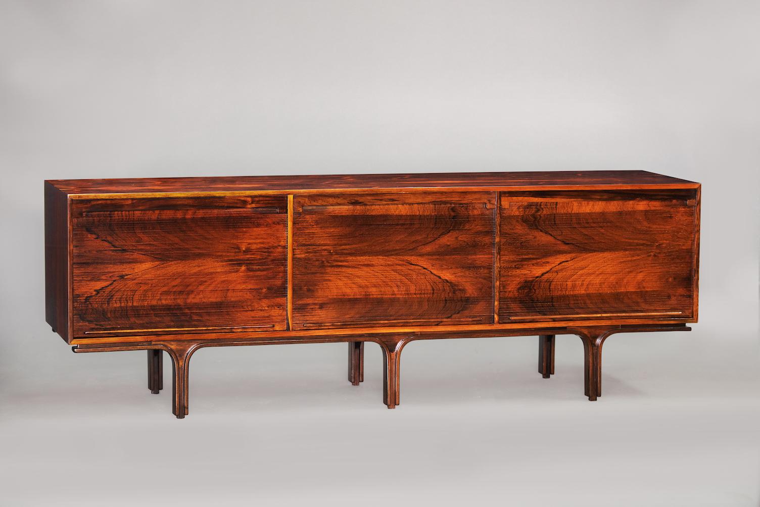 Gianfranco Frattini rosewood sideboard with tambour doors for Bernini.
  