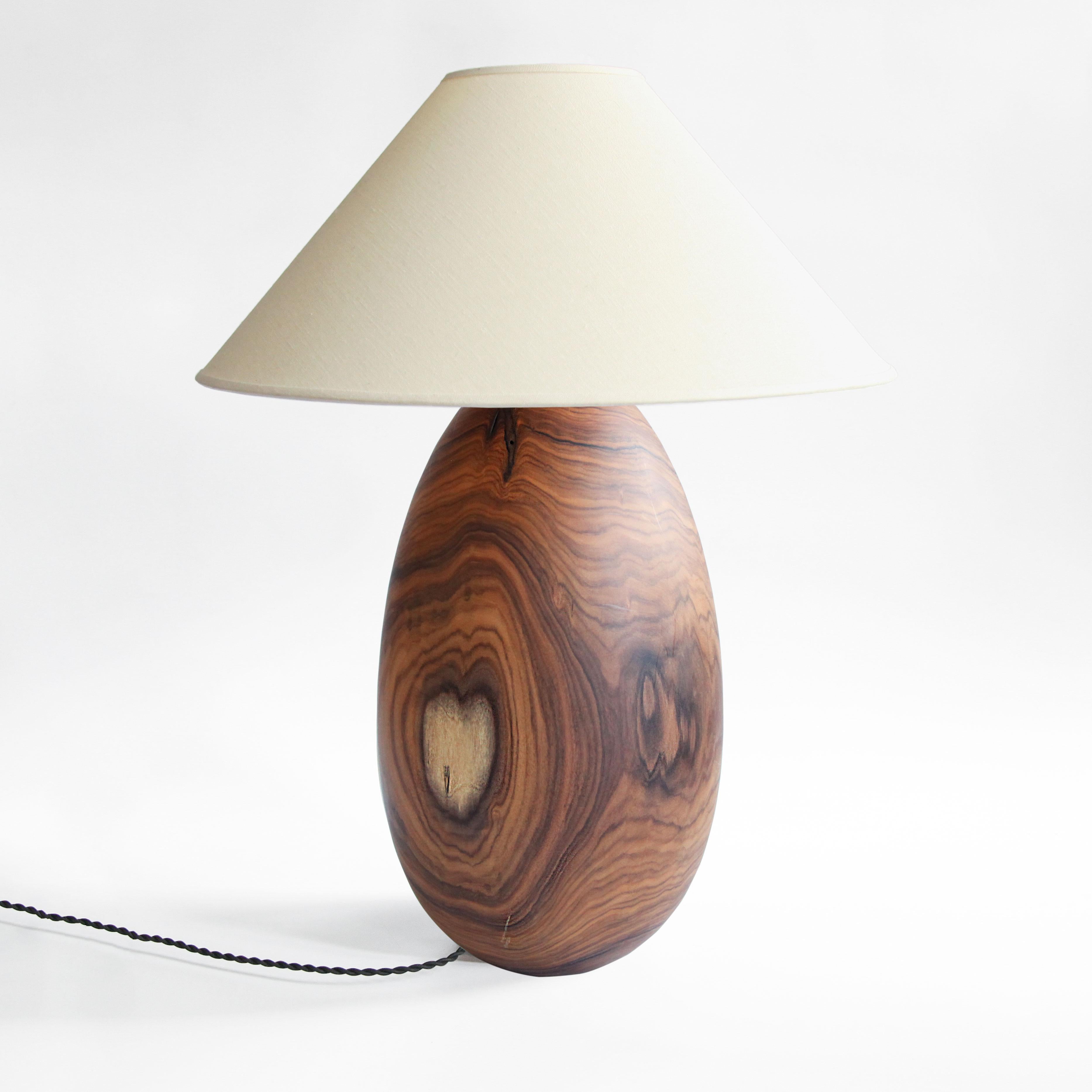 The Árbol collection is an embrace of tropical modernism; each lamp is composed of salvaged tropical hardwoods from the Bolivian city of Santa Cruz, where trees that are felled by natural causes—or for construction—are rescued by our team. A blend